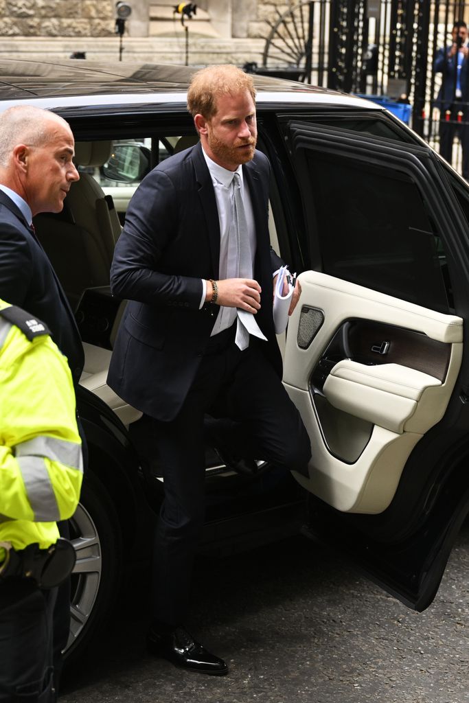 Prince Harry gets out of car