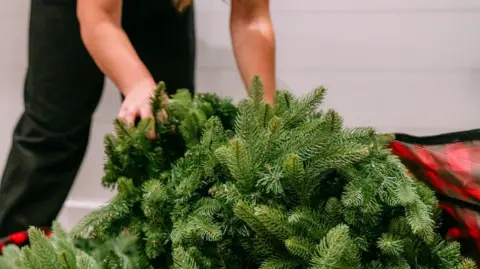 Getty Images ARtificial Christmas tree being taken out of a box