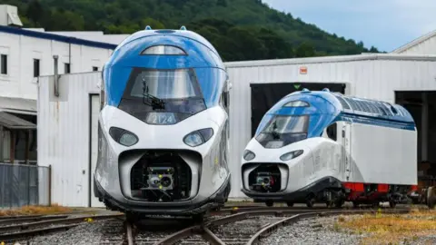 Getty Images Two power cars from Amtrak's new high-speed trains