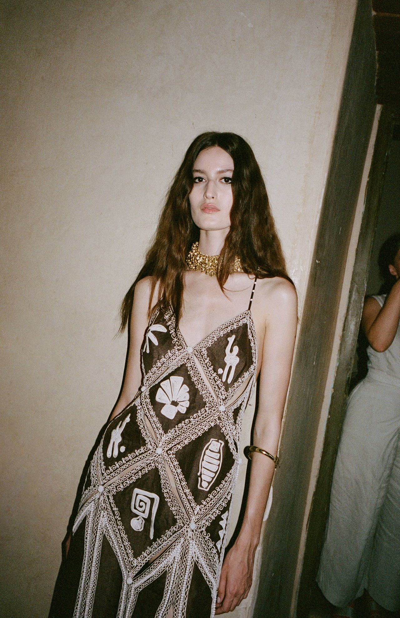 Image may contain Clothing Dress Accessories Jewelry Necklace Face Head Person Photography Portrait and Fashion