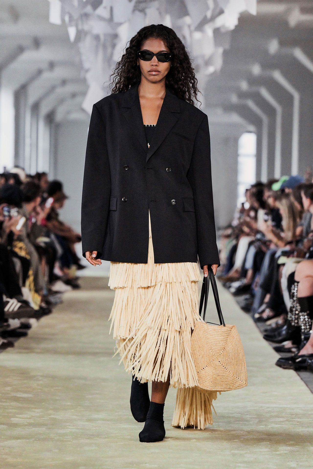 Image may contain Clothing Coat Accessories Glasses Adult Person Fashion Bag Handbag Blazer Jacket and Footwear