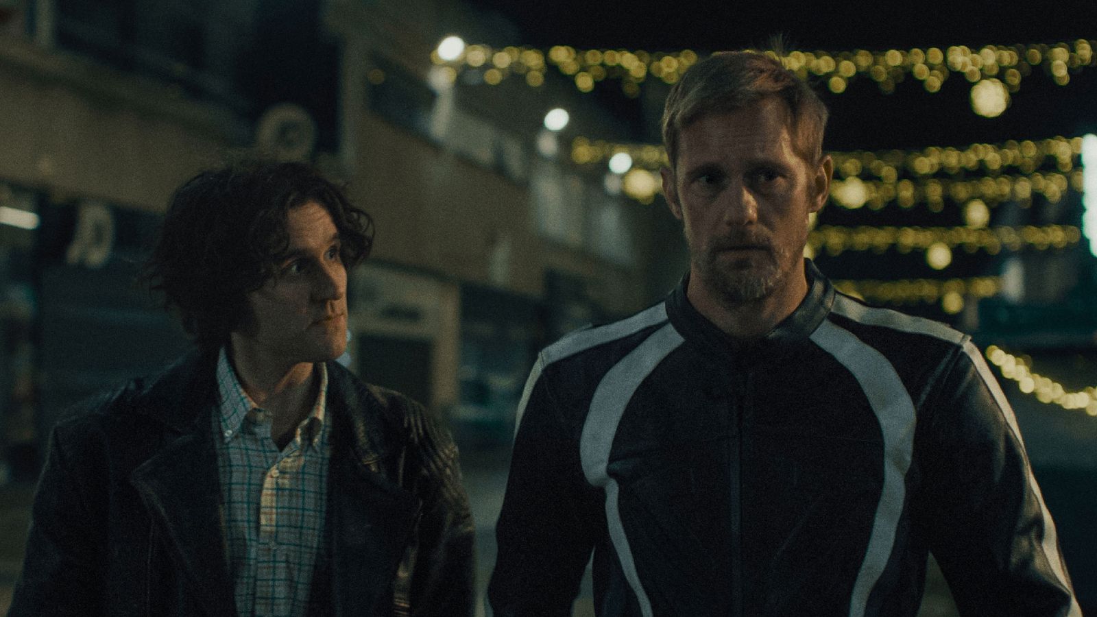 Image may contain Alexander Skarsgård Harry Melling Clothing Coat Jacket Adult Person Face Head and Photography