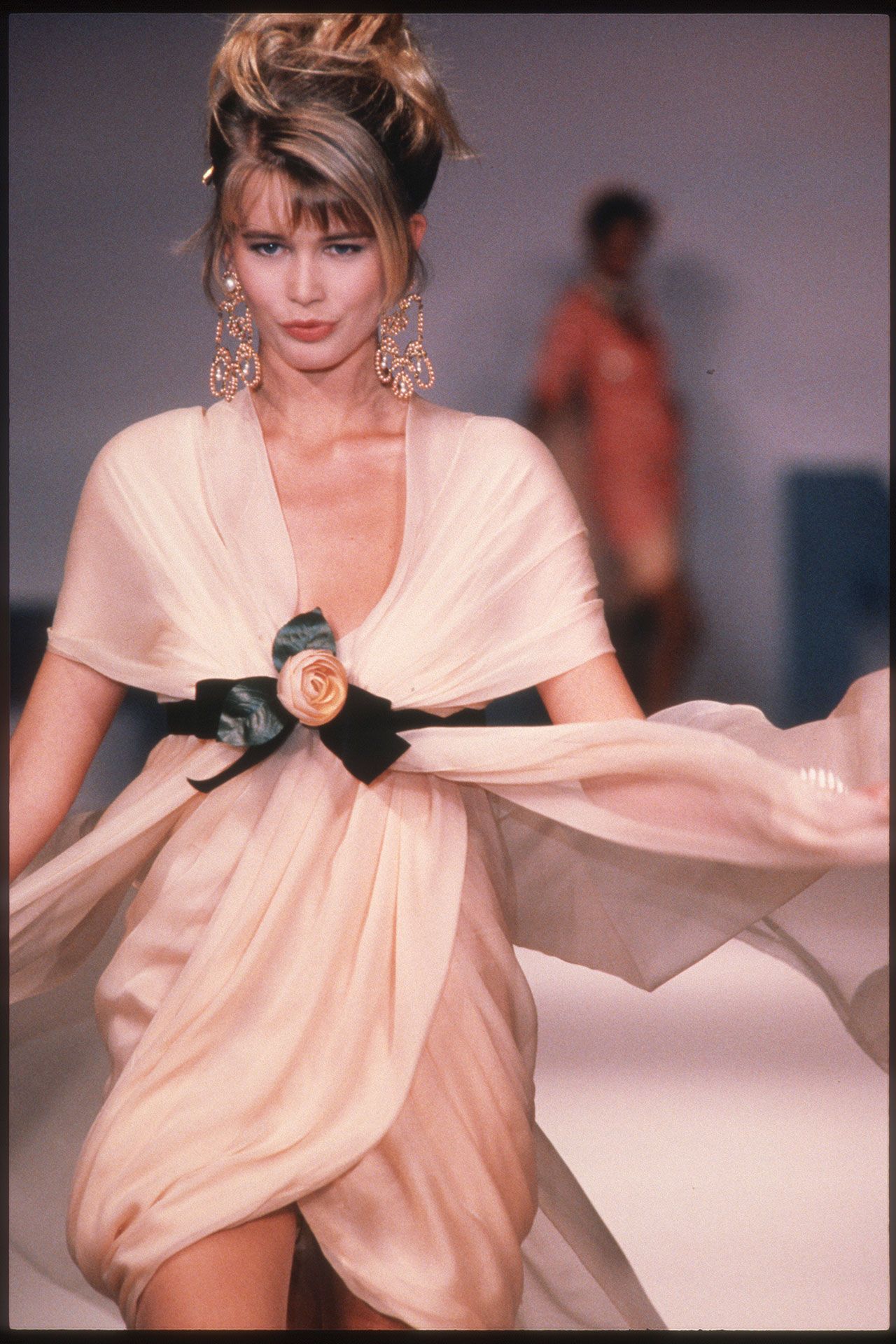 Image may contain Claudia Schiffer Clothing Dress Evening Dress Formal Wear Fashion Adult Person Wedding and Gown