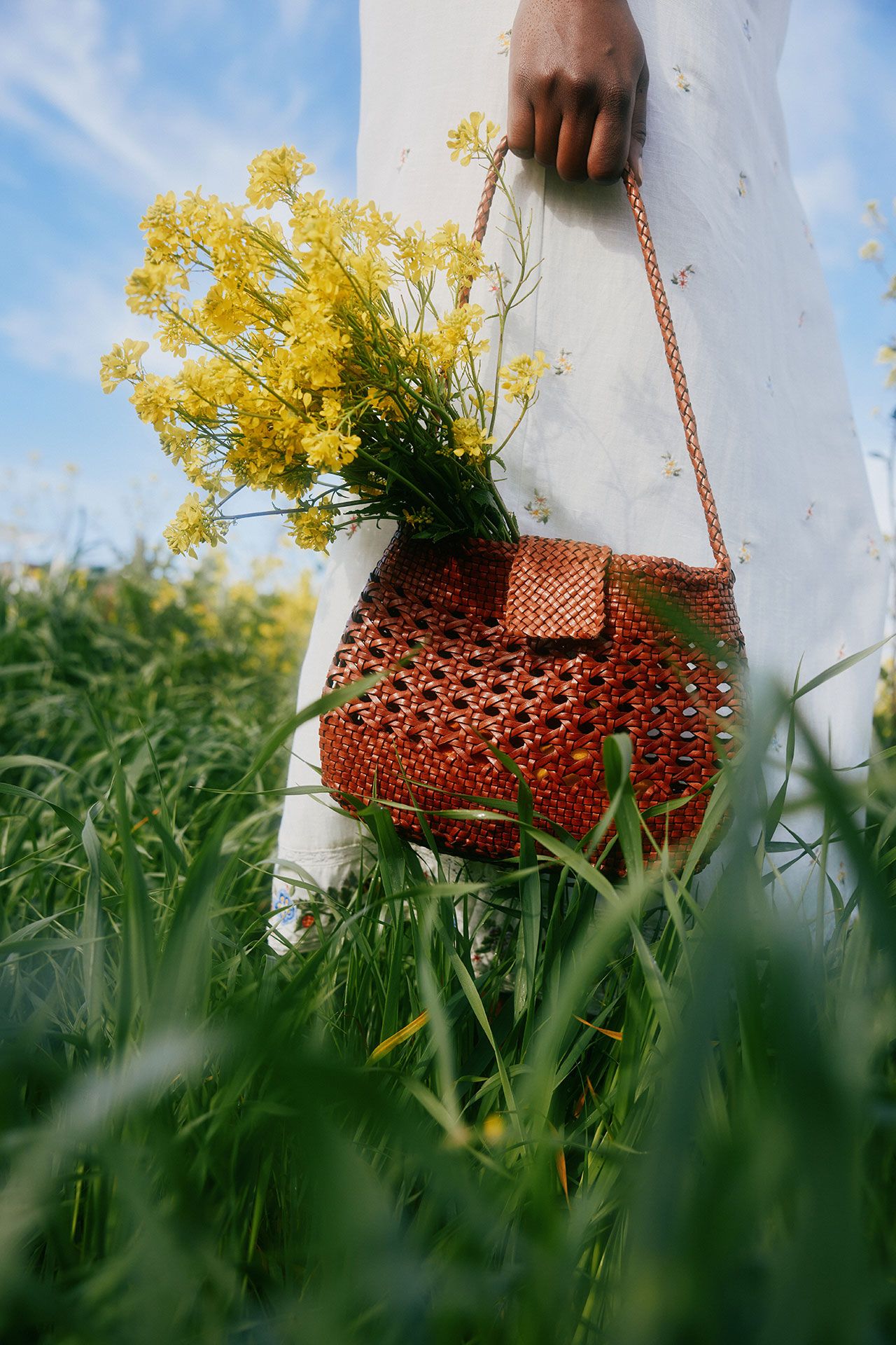 Image may contain Accessories Bag Handbag Art Handicraft Flower Plant Purse Herbal Herbs Baby and Person