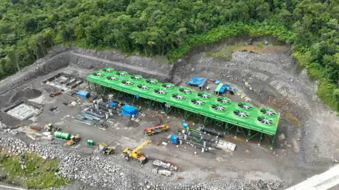 Ormat The geothermal power station under construction in a remote forested area