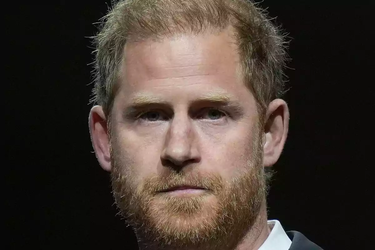 Close-up of Prince Harry looking directly at the camera with a serious expression.