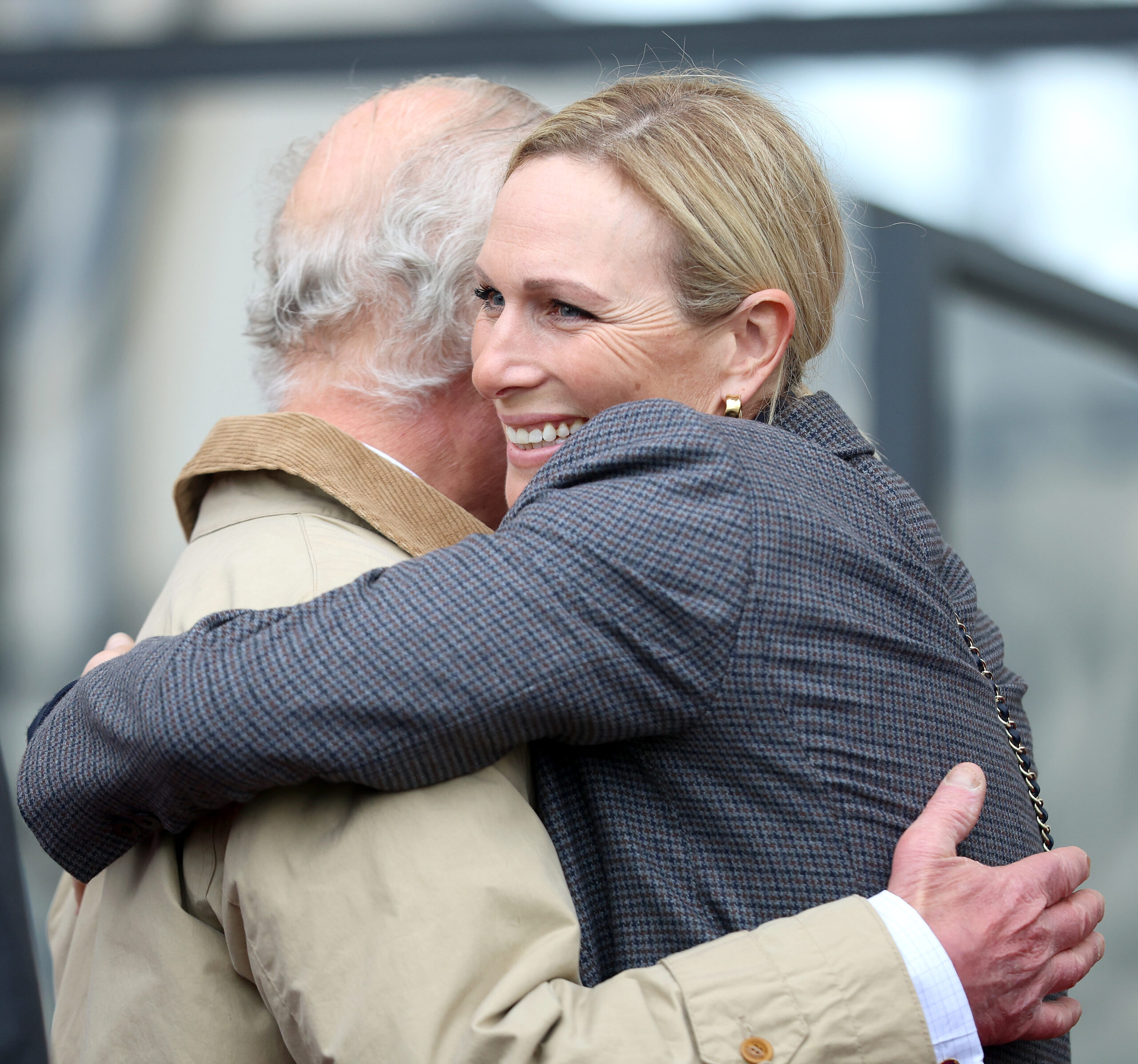 Zara Tindall hugging King Charles