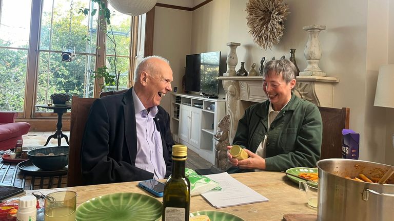 Philip and Clare giving gifts