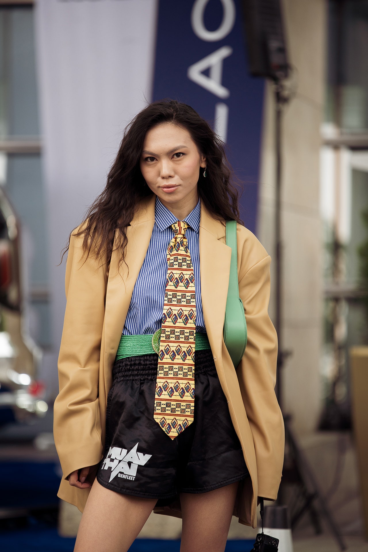 Image may contain Accessories Formal Wear Tie Blazer Clothing Coat Jacket Necktie Adult Person Shorts and Suit