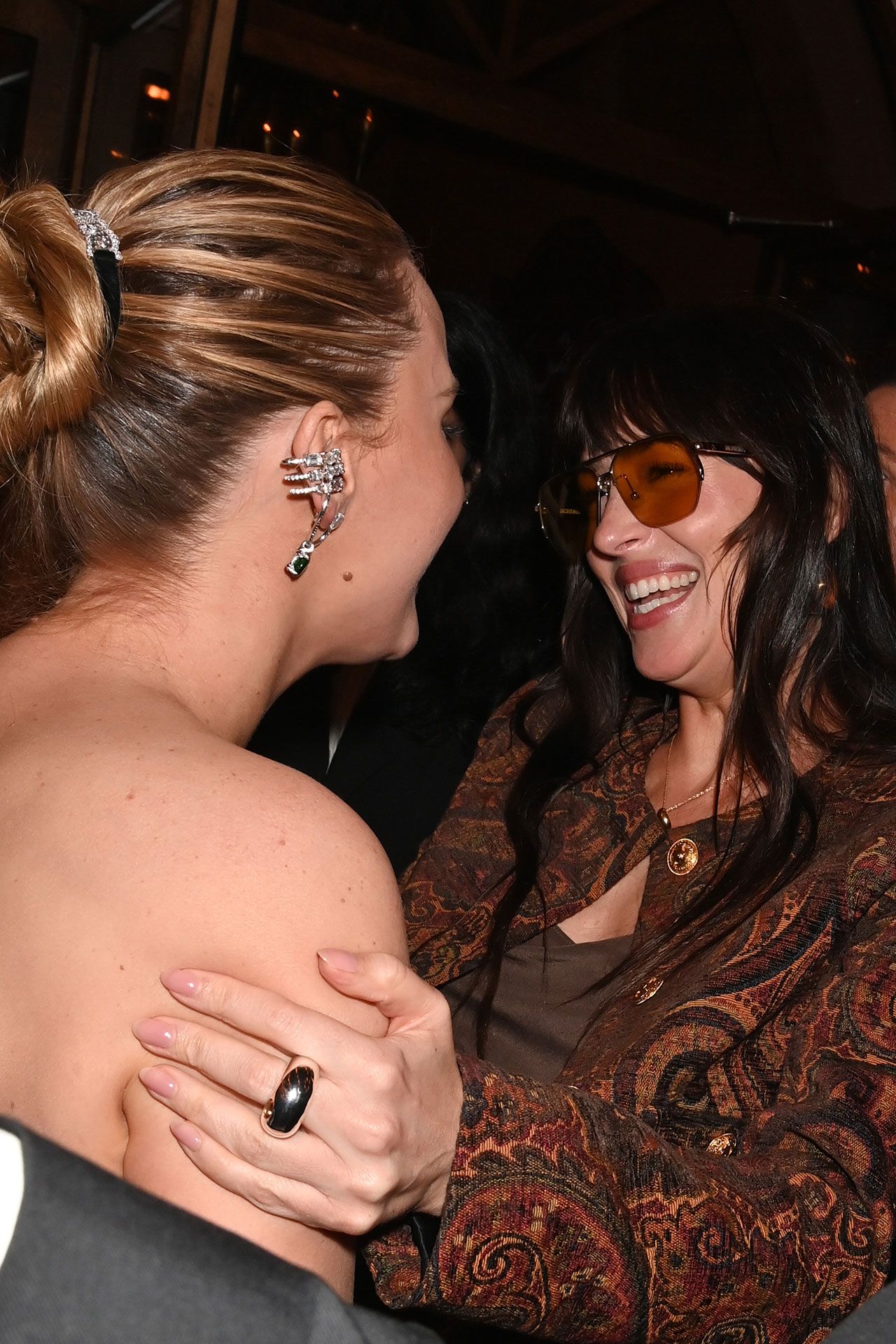 Image may contain Dakota Johnson Accessories Earring Jewelry Adult Person Glasses Face Head and Photography