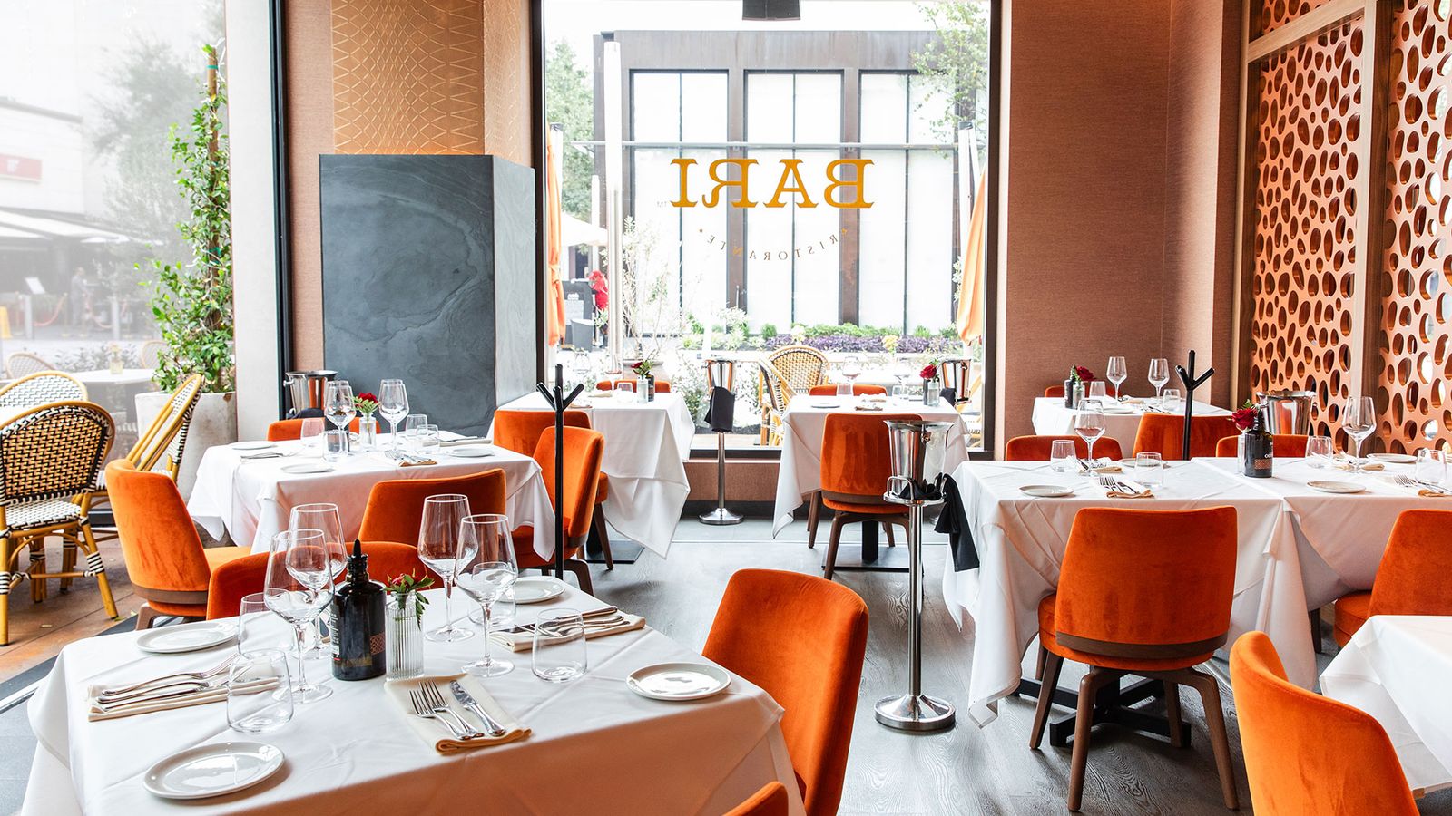 Image may contain Indoors Restaurant Architecture Building Dining Room Dining Table Furniture Room Table and Plate