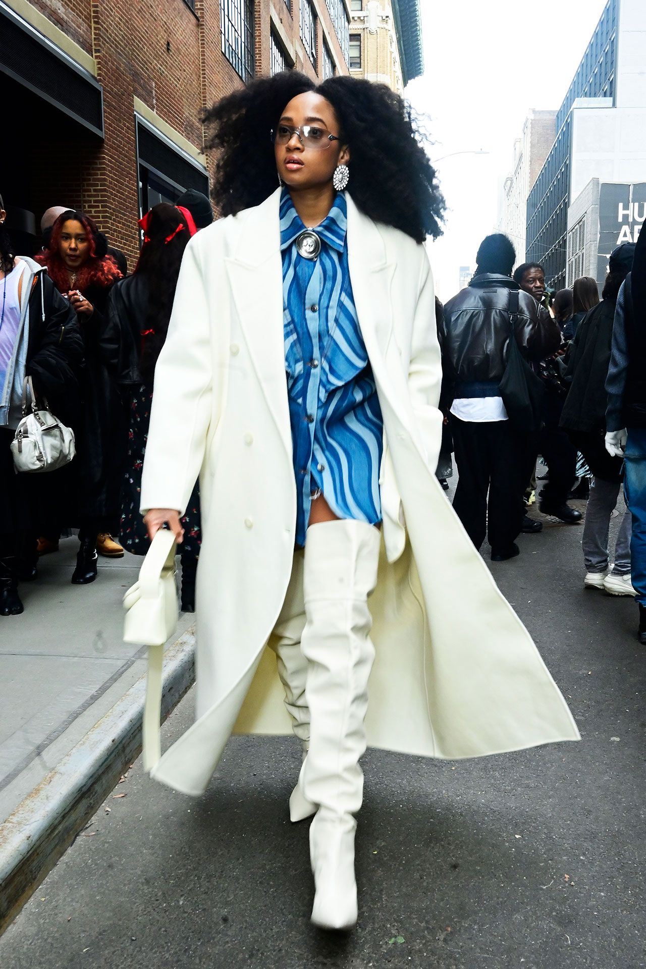 Image may contain Clothing Coat Glove Accessories Bag Handbag Adult Person Blazer Jacket Glasses and Footwear how to...