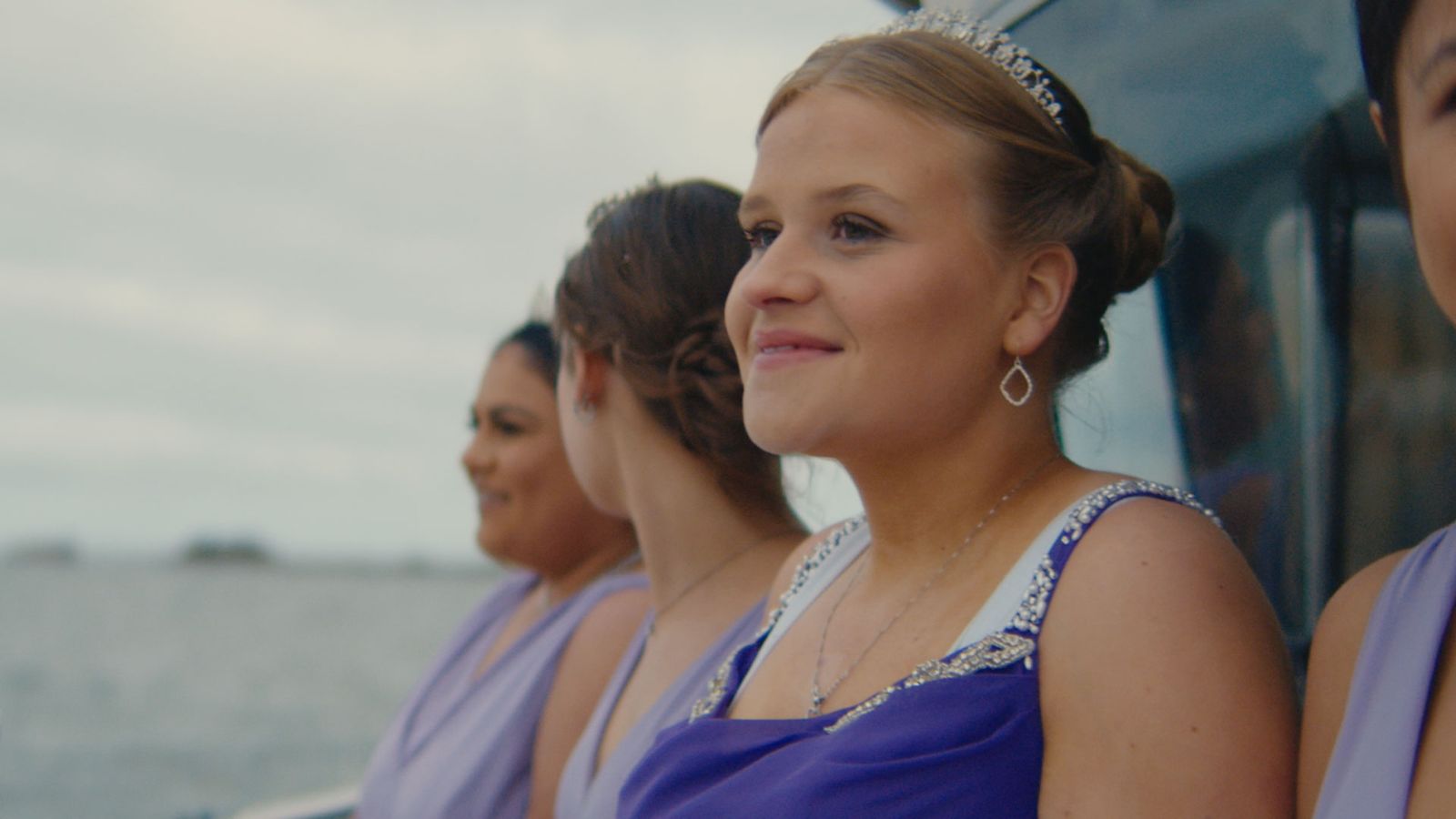 Image may contain Clothing Dress Accessories Jewelry Necklace Adult Person Wedding Earring Face and Head