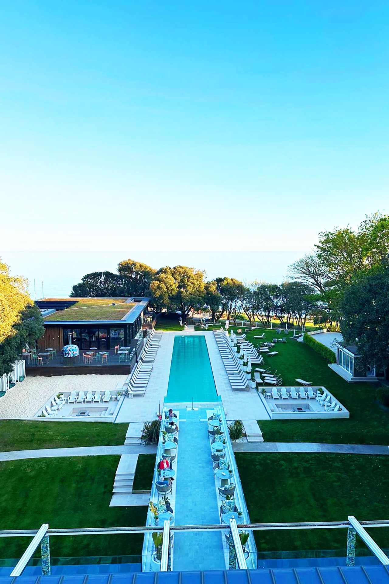 Image may contain Pool Water Swimming Pool Outdoors Aerial View and Person