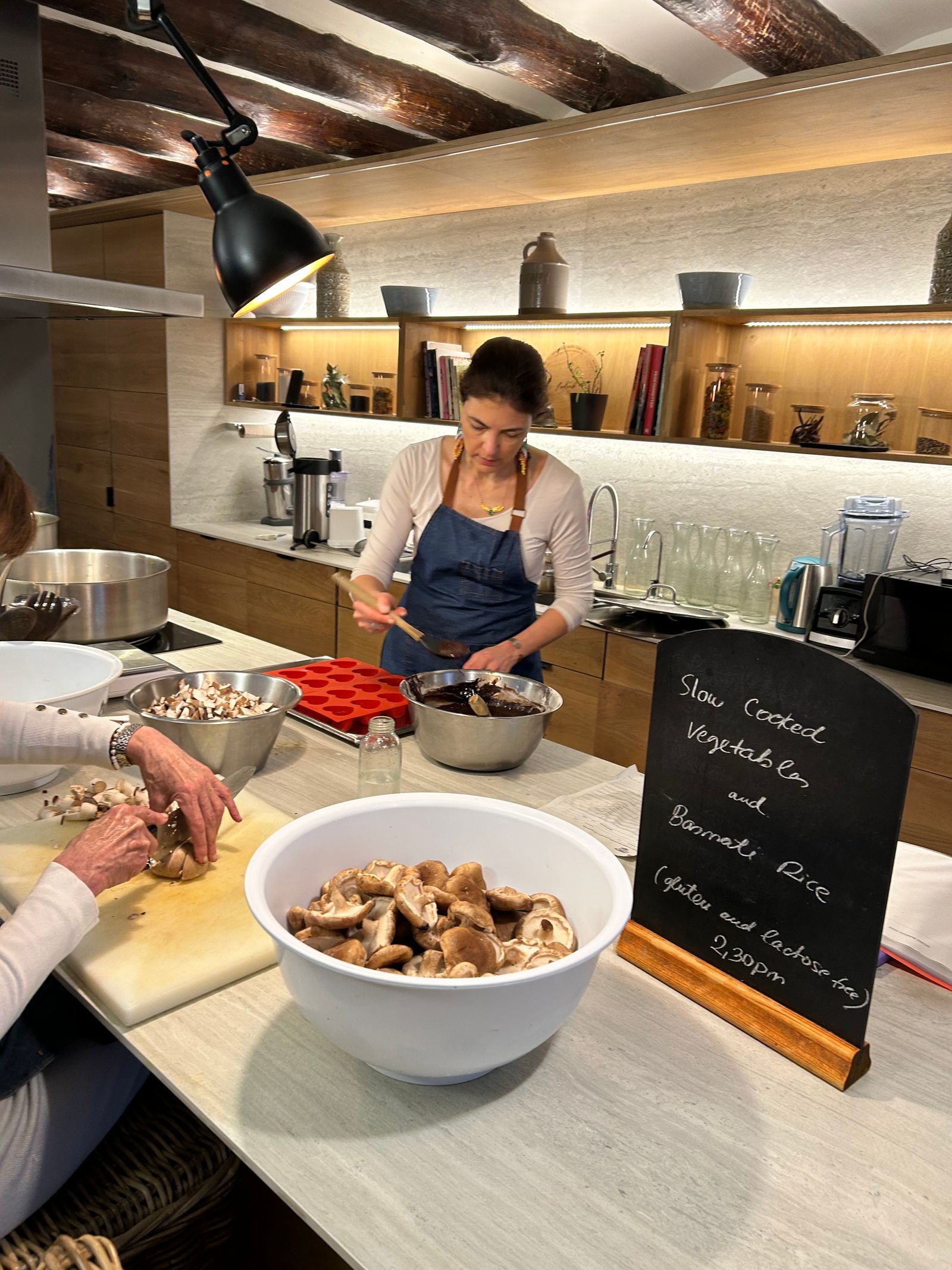 Image may contain Adult Person Plant Sink Sink Faucet Lamp Accessories Jewelry Necklace Bowl and Wristwatch