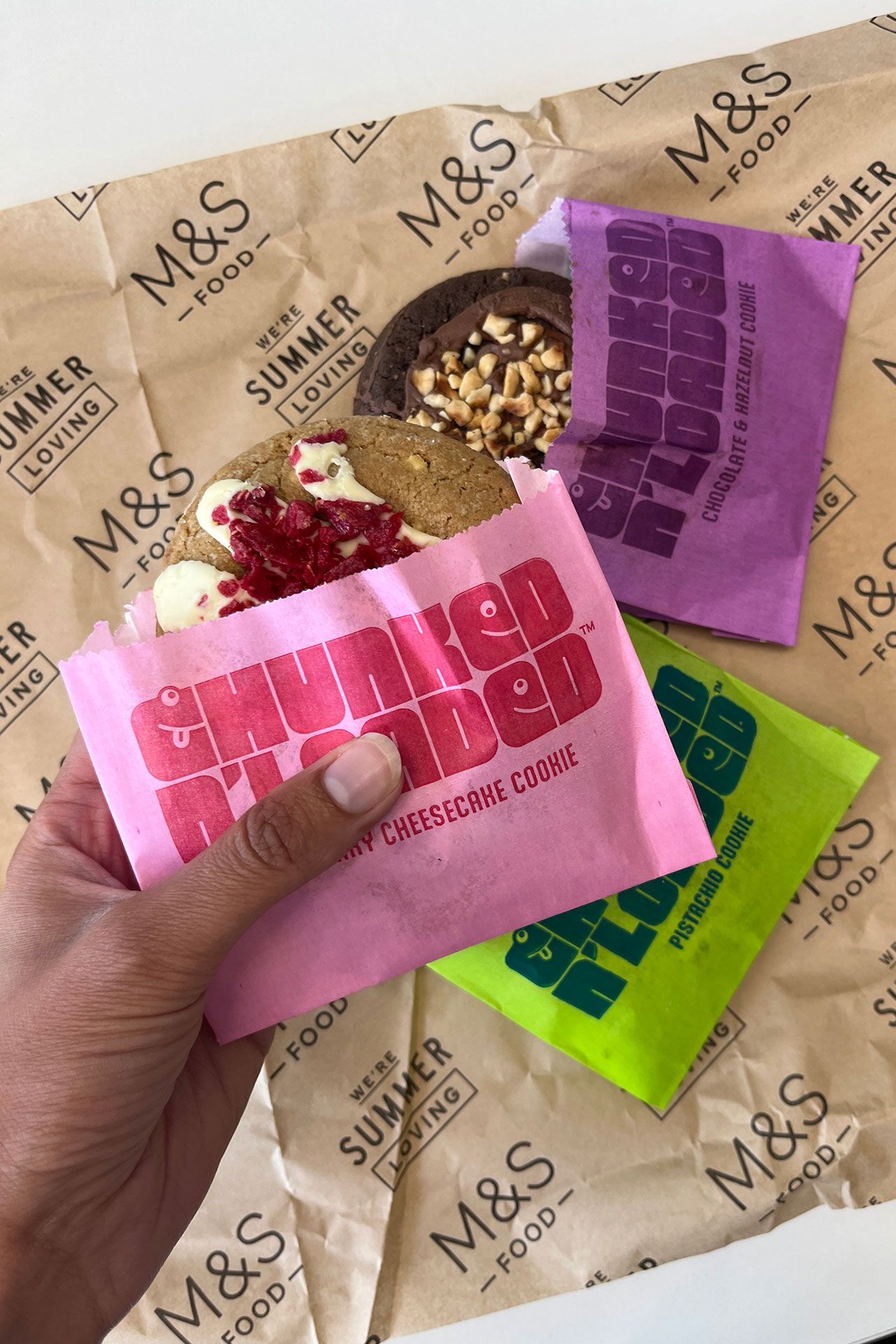 Image may contain Baby Person Bread Food Sweets Snack Advertisement Cream Dessert and Frozen Yogurt