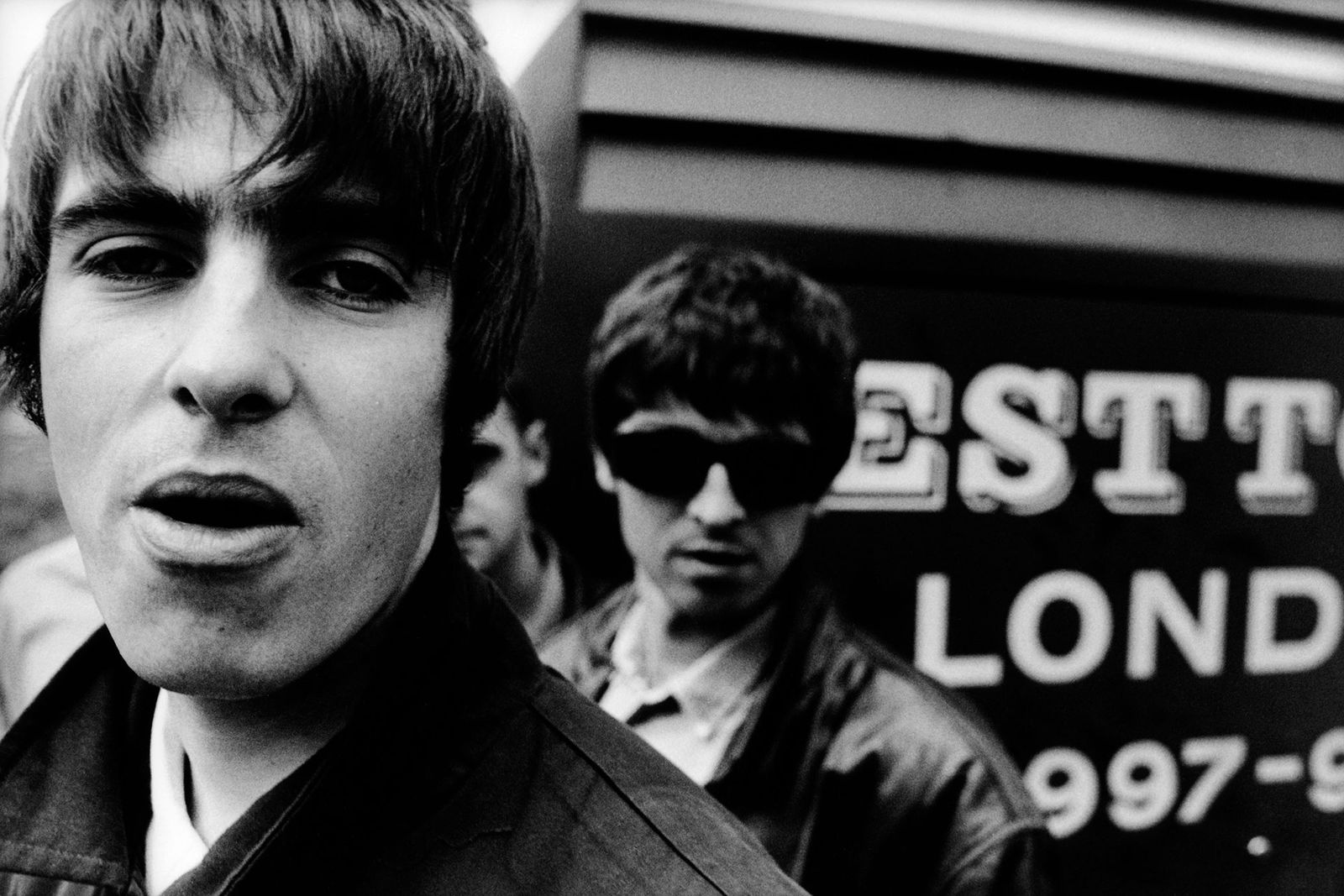 Image may contain Liam Gallagher Noel Gallagher Face Head Person Photography Portrait Accessories and Sunglasses