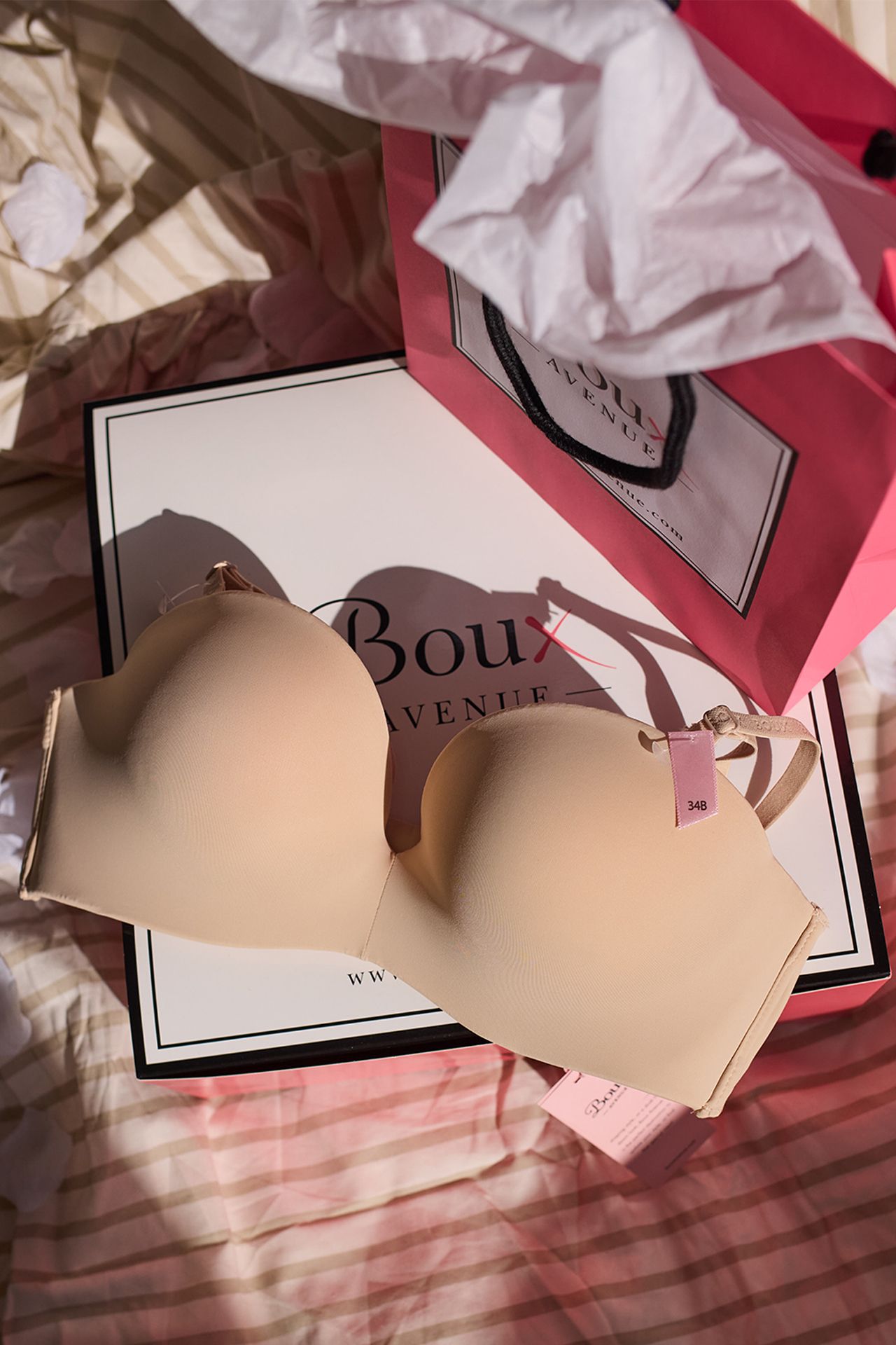 Image may contain Bra Clothing Lingerie Underwear Symbol Accessories and Wallet