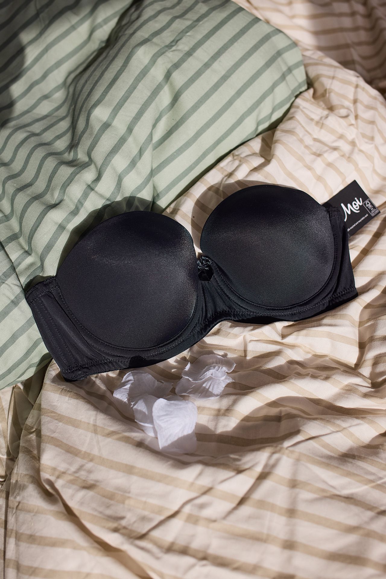 Image may contain Bra Clothing Lingerie Underwear Accessories Bag Handbag Bed and Furniture