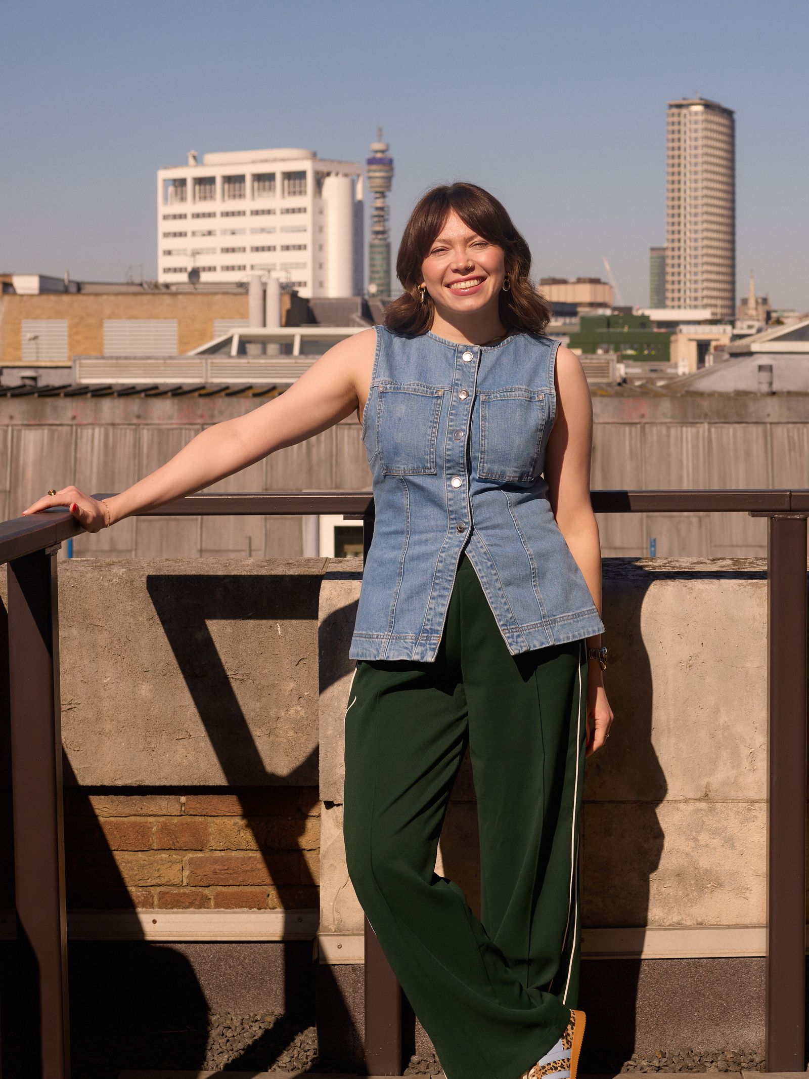 Image may contain Daisy Lewis Clothing Pants Blouse Face Head Person Photography Portrait Jeans City and Footwear