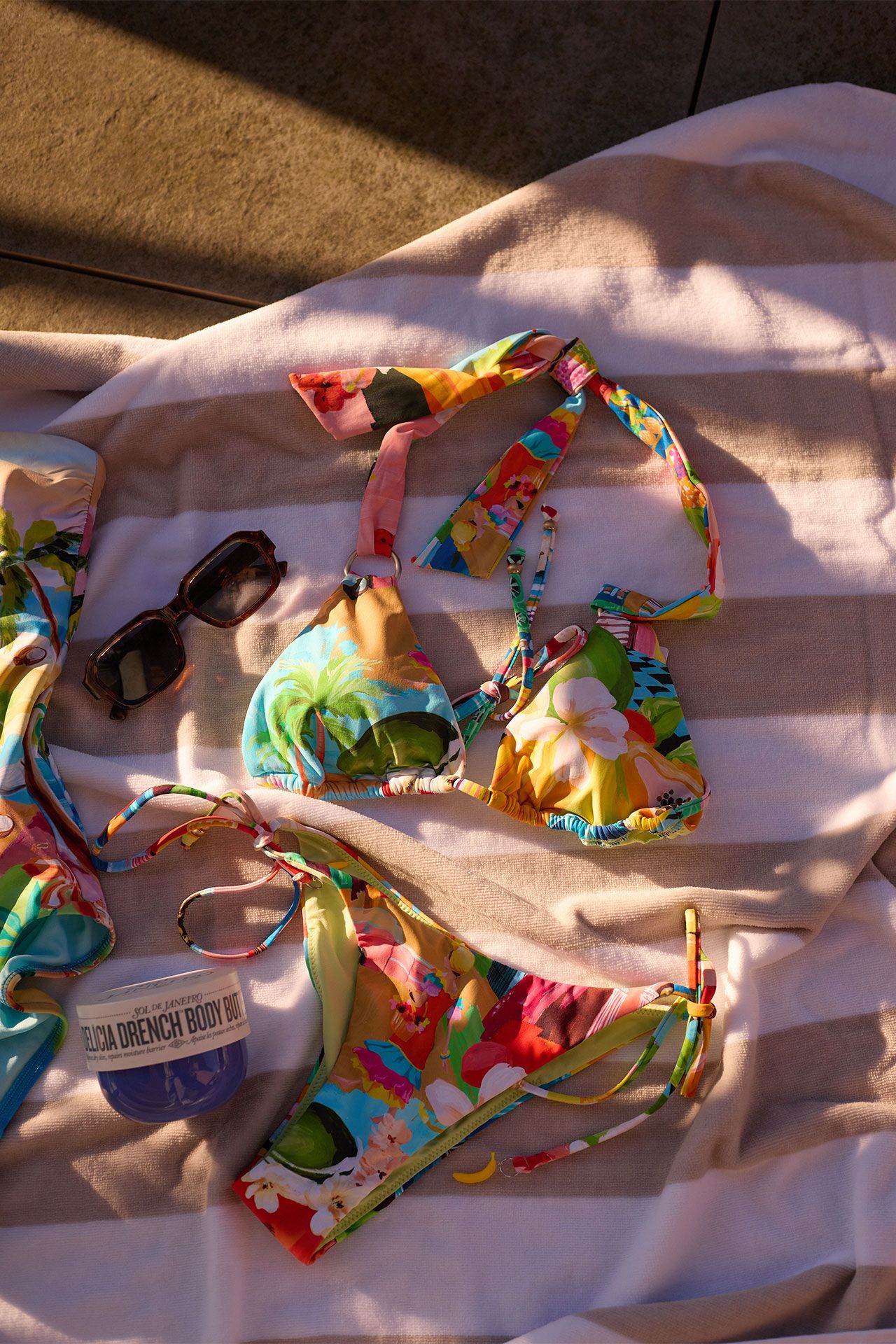 Image may contain Accessories Bag Handbag Purse Glasses Clothing Swimwear Hat Bed and Furniture