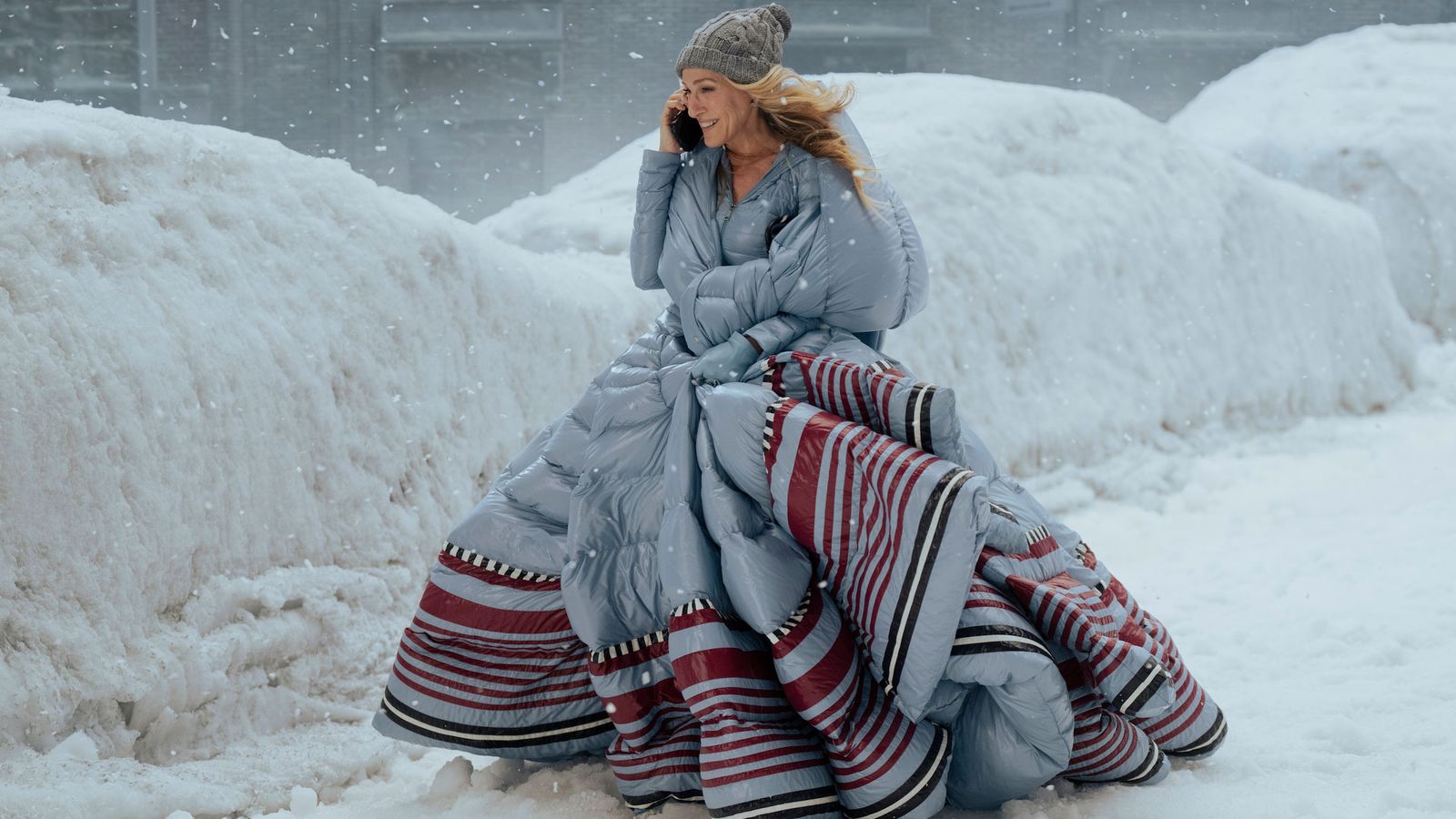 Image may contain Sarah Jessica Parker Blanket Adult Person Outdoors Nature Clothing Glove Winter Hat and Snow