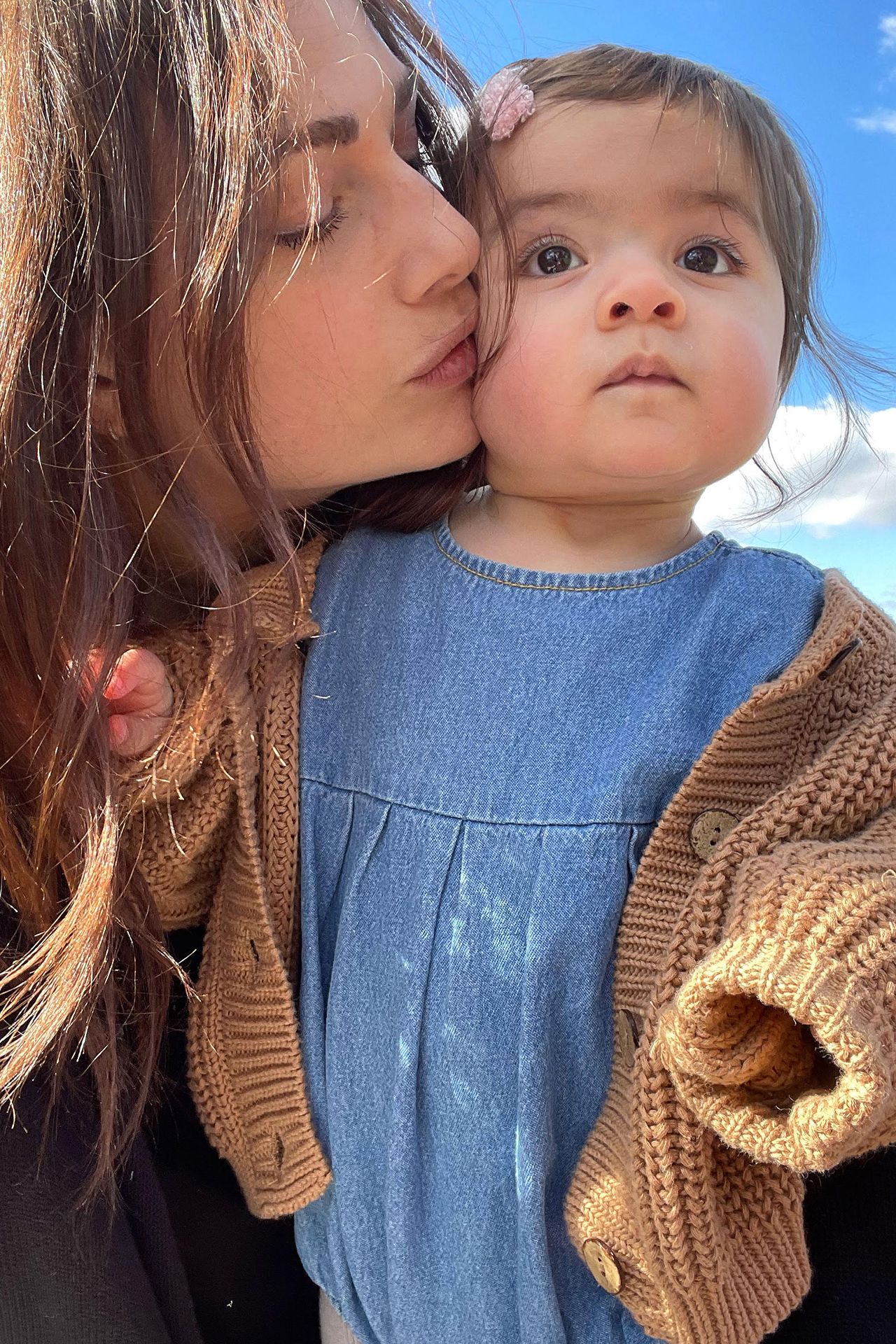 Image may contain Face Head Person Photography Portrait People Teen Baby Kissing Romantic Clothing and Knitwear