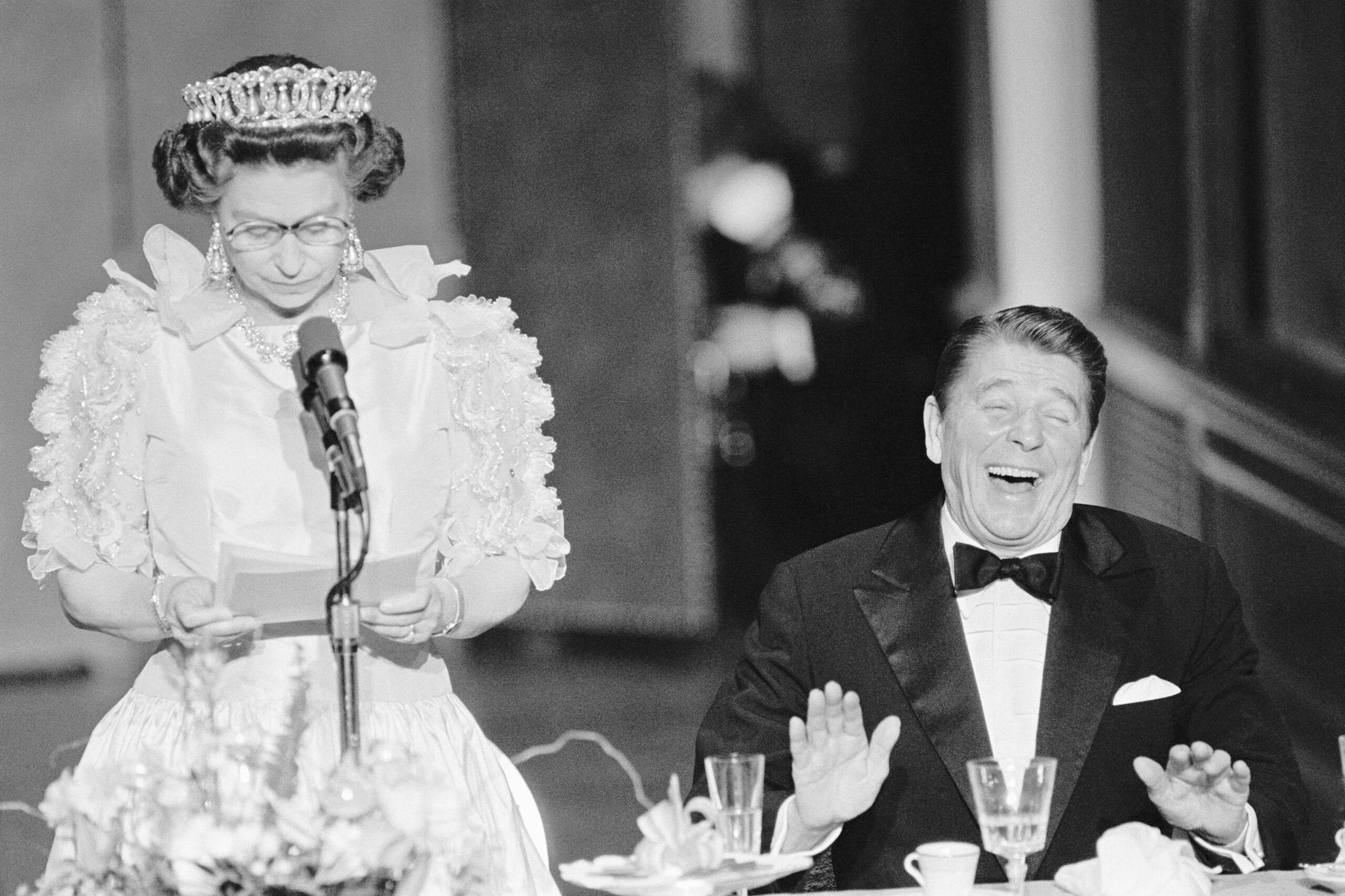 President Reagan laughing at Queen Elizabeth II's joke.