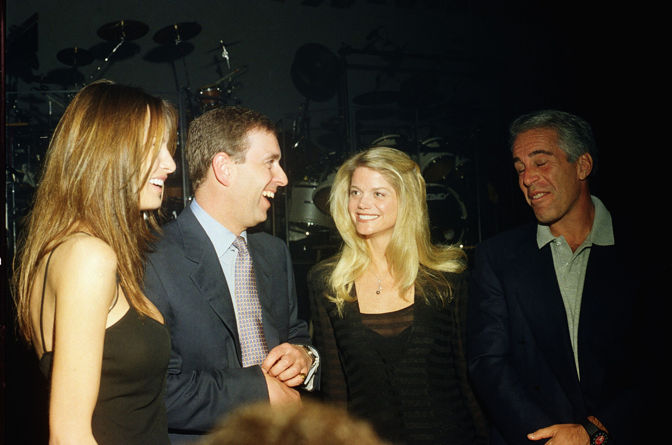 Melania Trump, Prince Andrew, Gwendolyn Beck, and Jeffrey Epstein at a party at the Mar-a-Lago club.