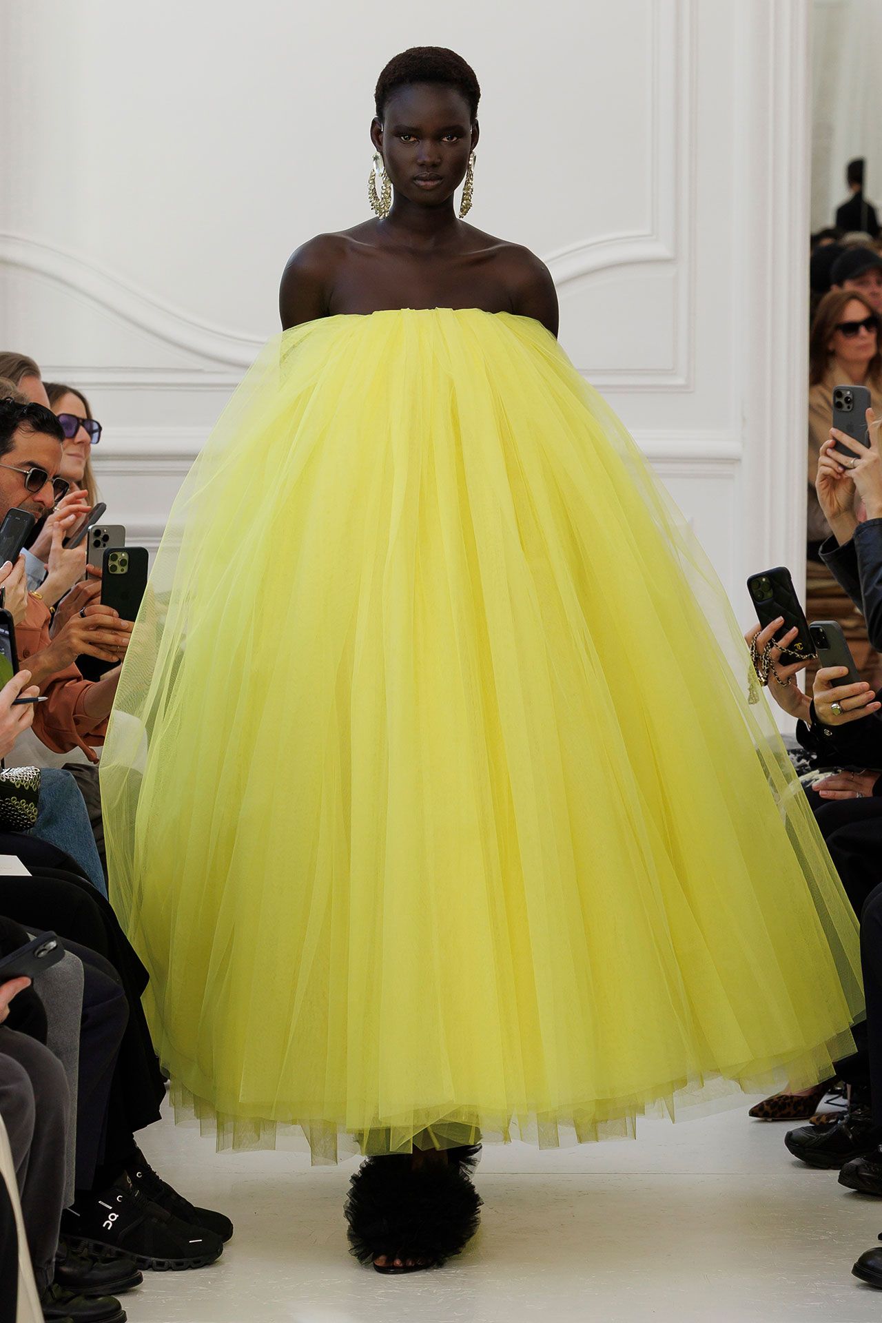 Image may contain Rebecca Nyandeng De Mabior Gabrielle Anwar Clothing Dress Fashion Formal Wear and Electronics