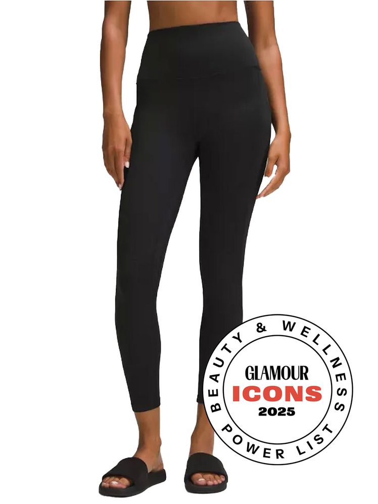 Image may contain: Clothing, Hosiery, Tights, Pants, Adult, Person, Footwear, and Sandal