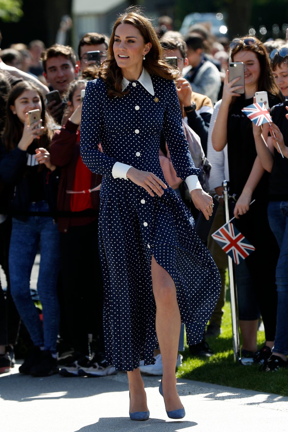 catherine, duchess of cambridge, arrives to visit the d day exhibition at bletchley park on may 14, 2019 in bletchley, england in a polka dot dress with a split up the front
