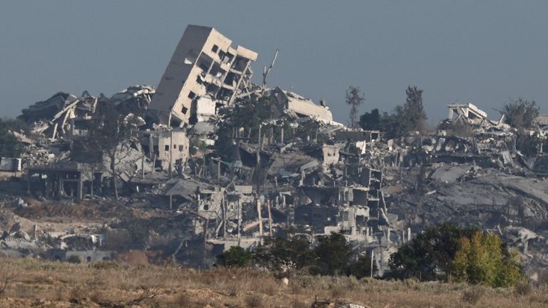 Destroyed buildings in Gaza, as seen from Israeli side of the border. Pic: Reuters