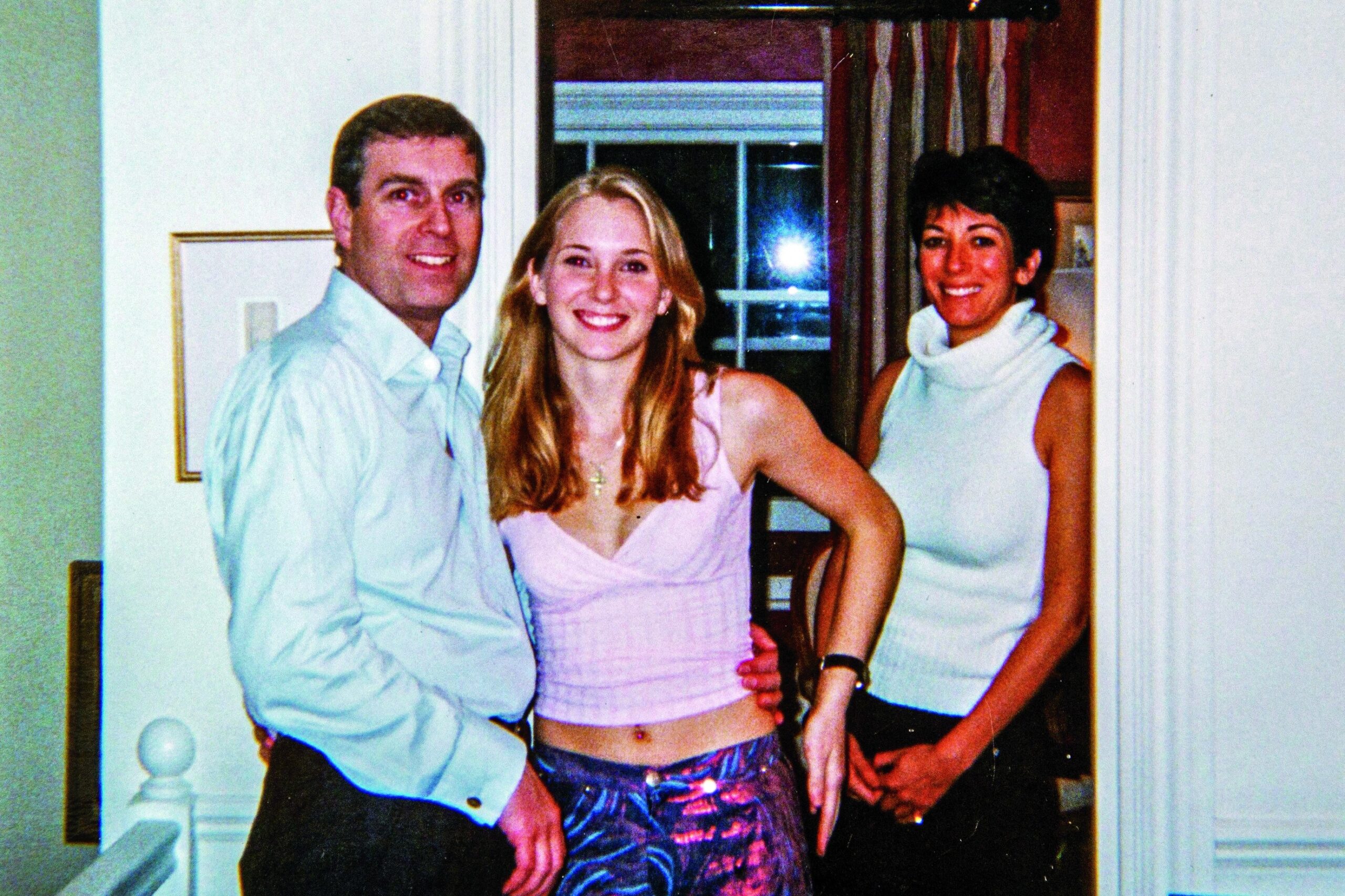 Virginia Roberts Giuffre, Prince Andrew, and Ghislaine Maxwell posing in Maxwell's London townhouse.