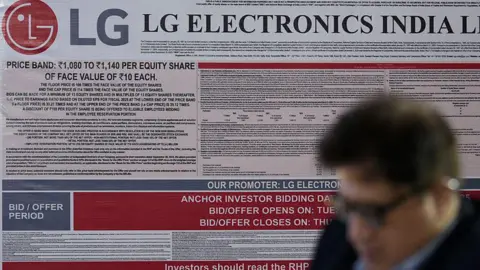 Getty Images The board of LG Electronics India Limited with a man in the front is seen during a press conference announcing the company's Initial Public Offering (IPO) in Mumbai city on 1 October, 2025.