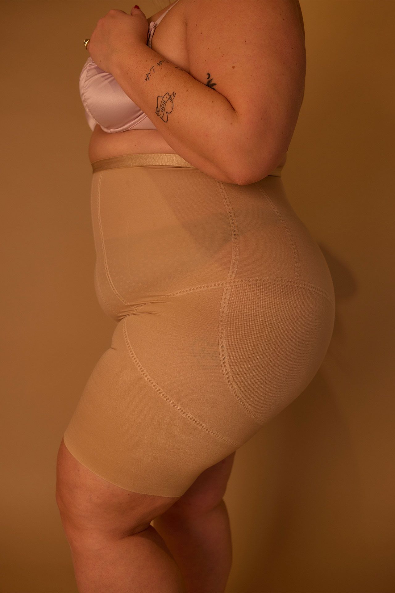 Image may contain Baby Person Body Part Thigh Clothing and Shorts