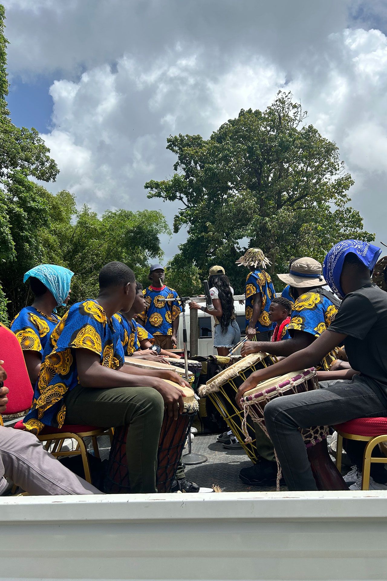 Musicians beat drums during the procession