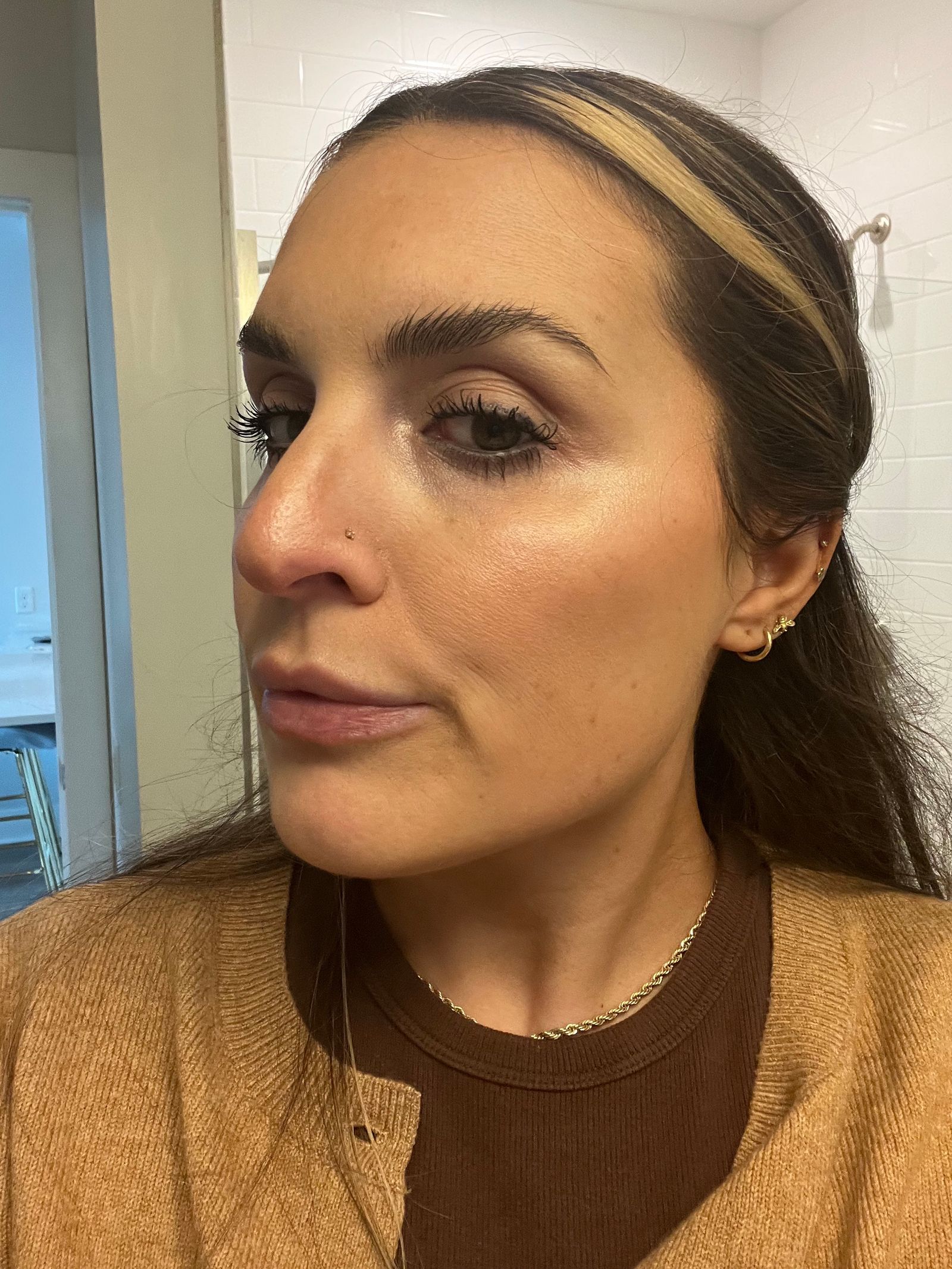 Wearing snail products cream under makeup.