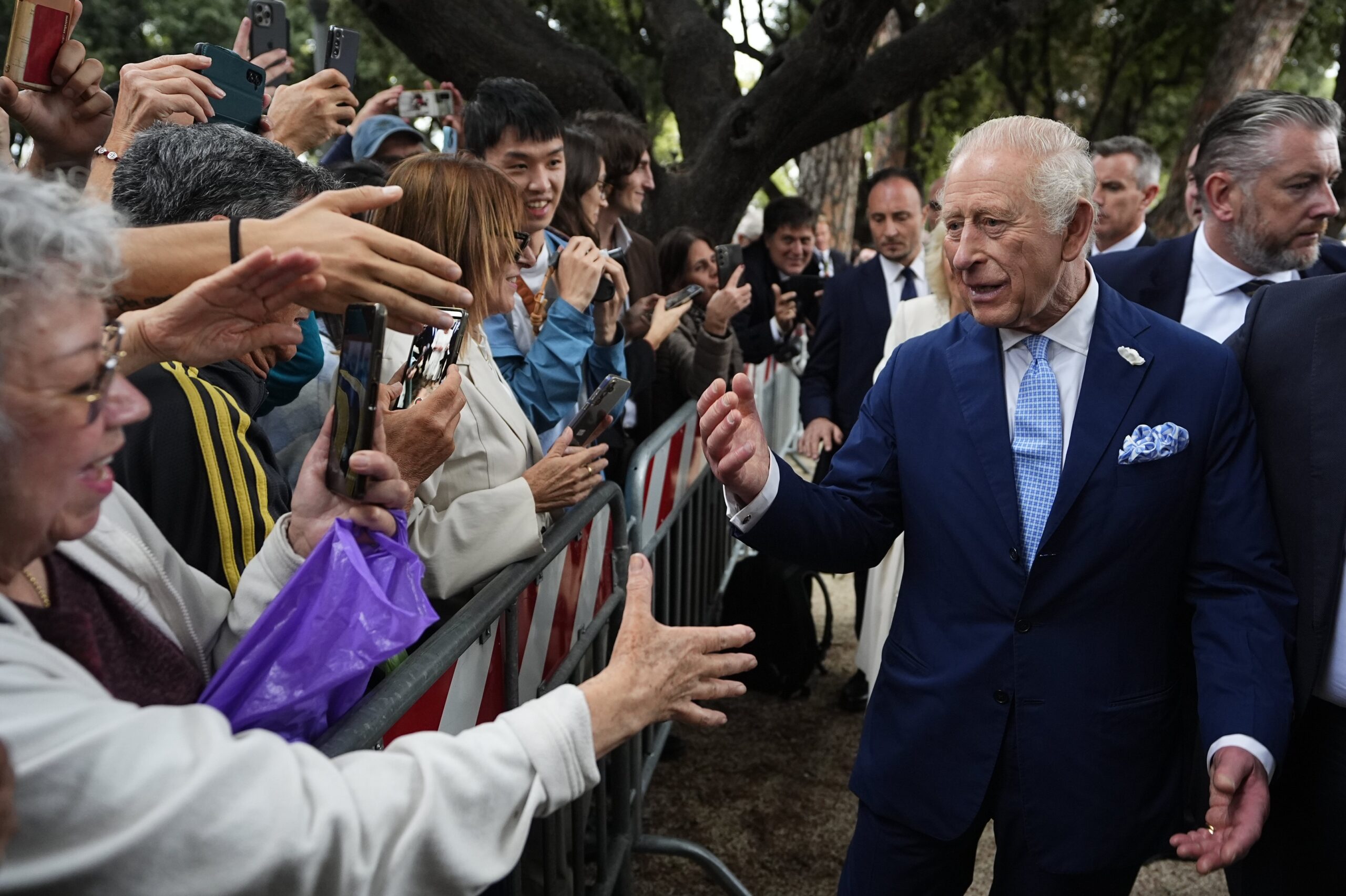King Charles III, by far the richest British sovereign in modern times, meets members of the public outside the Papal Basilica (Aaron Chown/PA)