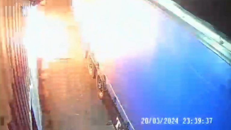 CCTV of three men setting fire to a warehouse