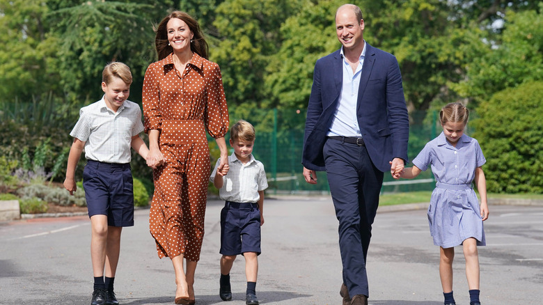 The Wales family walking together