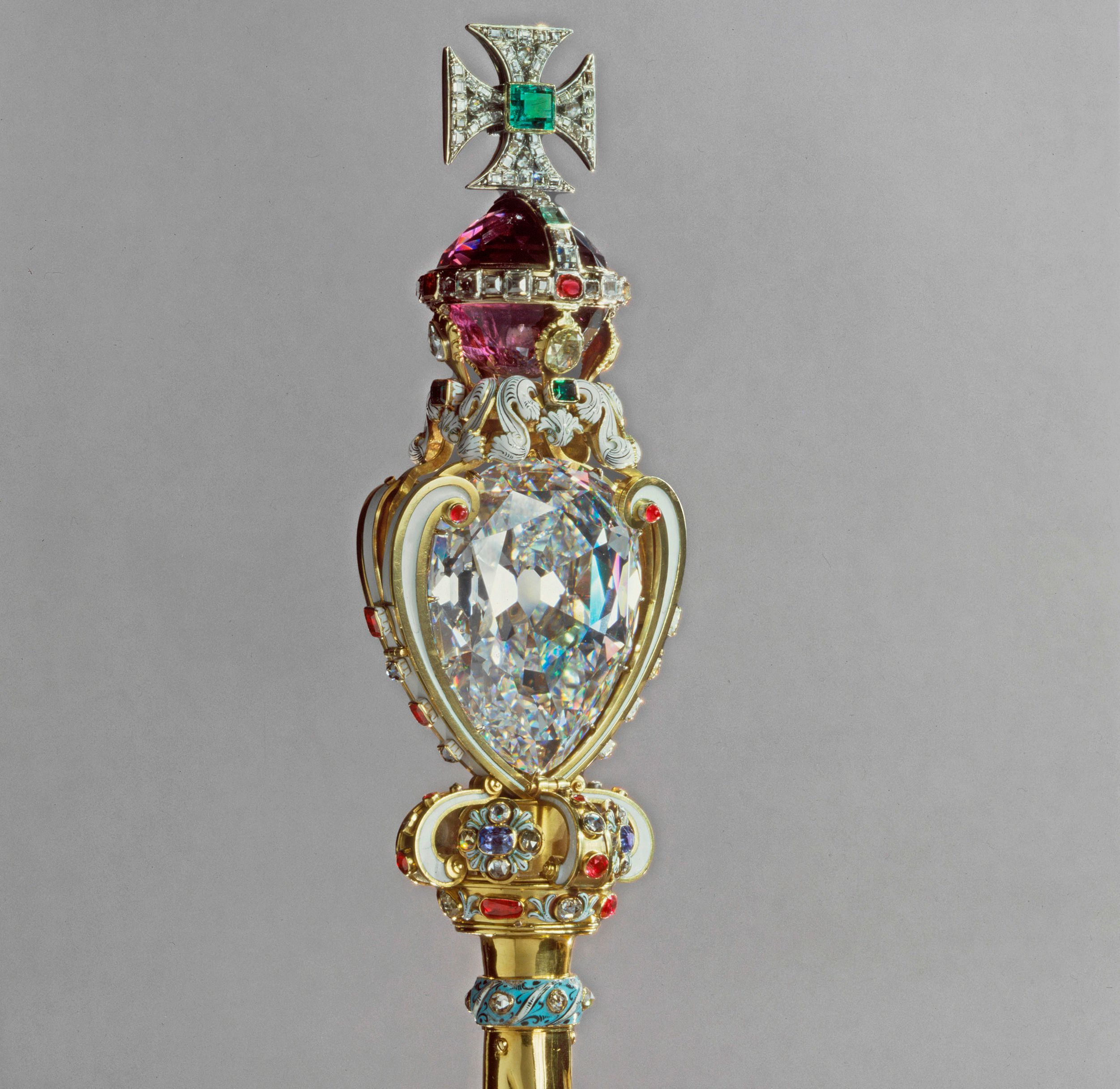 The Sovereign's Sceptre with Cross, topped with the Cullinan I diamond and a cross with an emerald in the center.