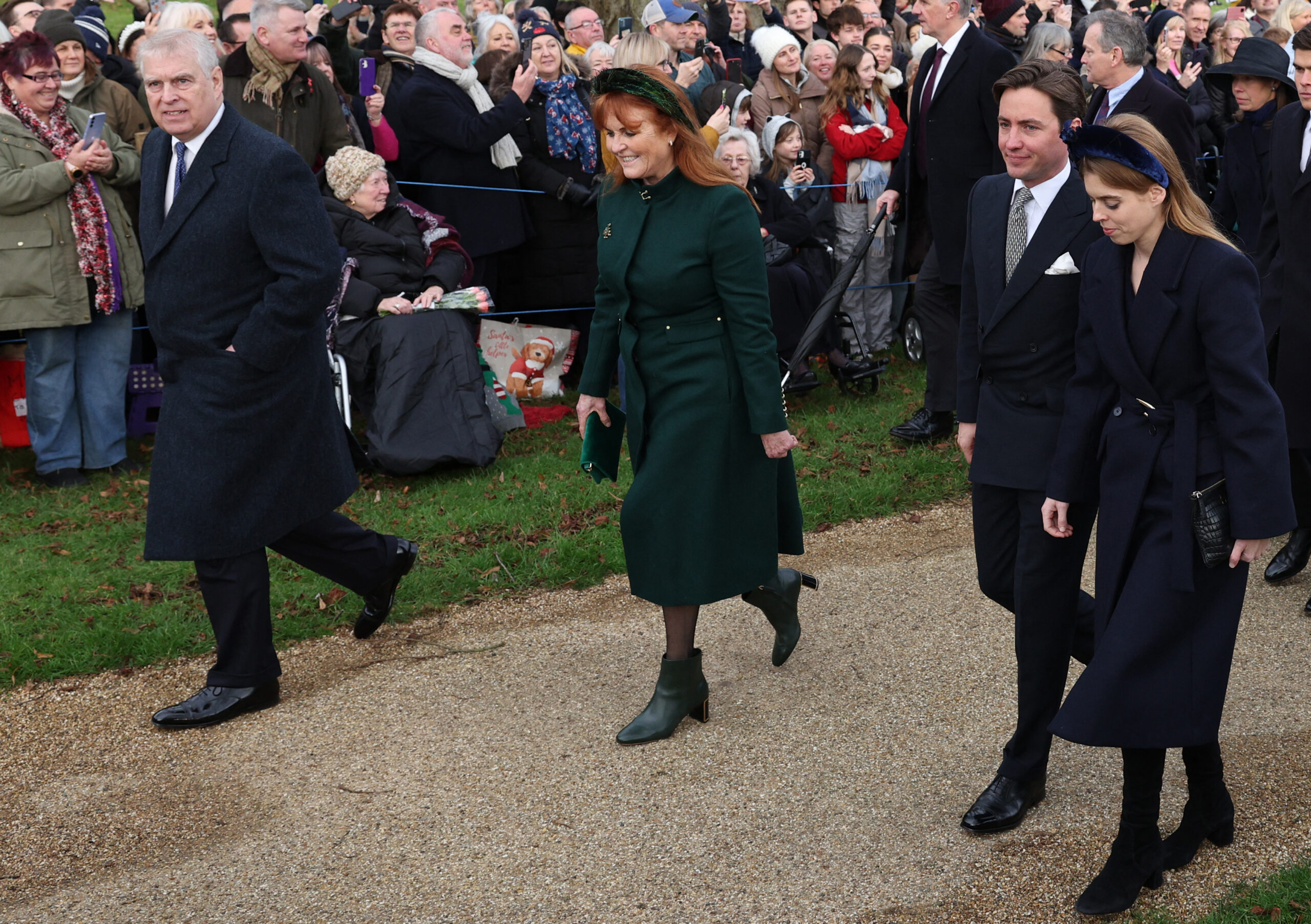Prince Andrew walking next to Sarah Ferguson, Princess Beatrice and Edoardo Mapelli Mozzi on Christmas