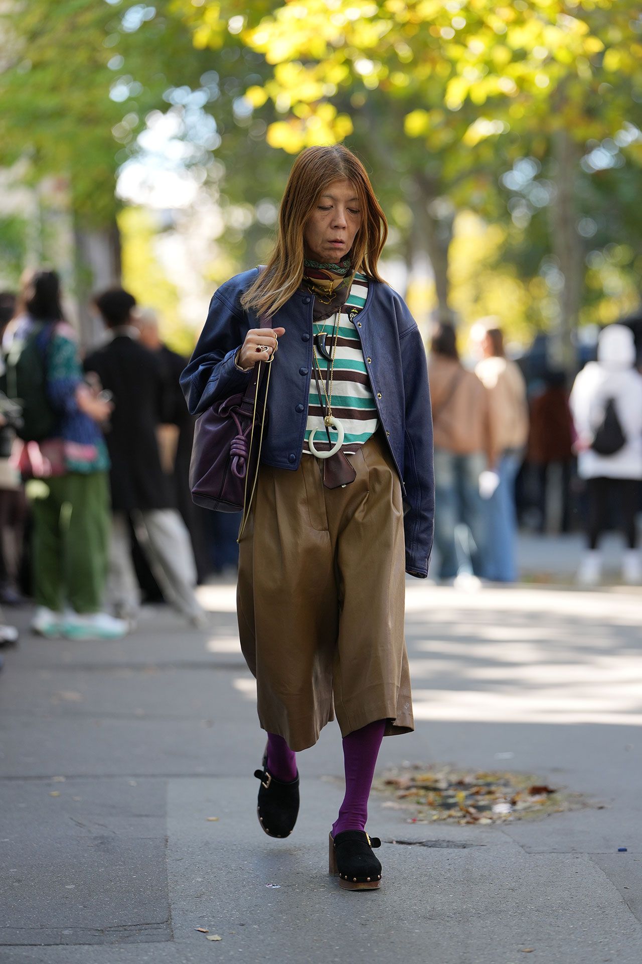 Image may contain Tomoko Kawase Pedestrian Person Clothing Coat Adult Accessories Bag and Handbag