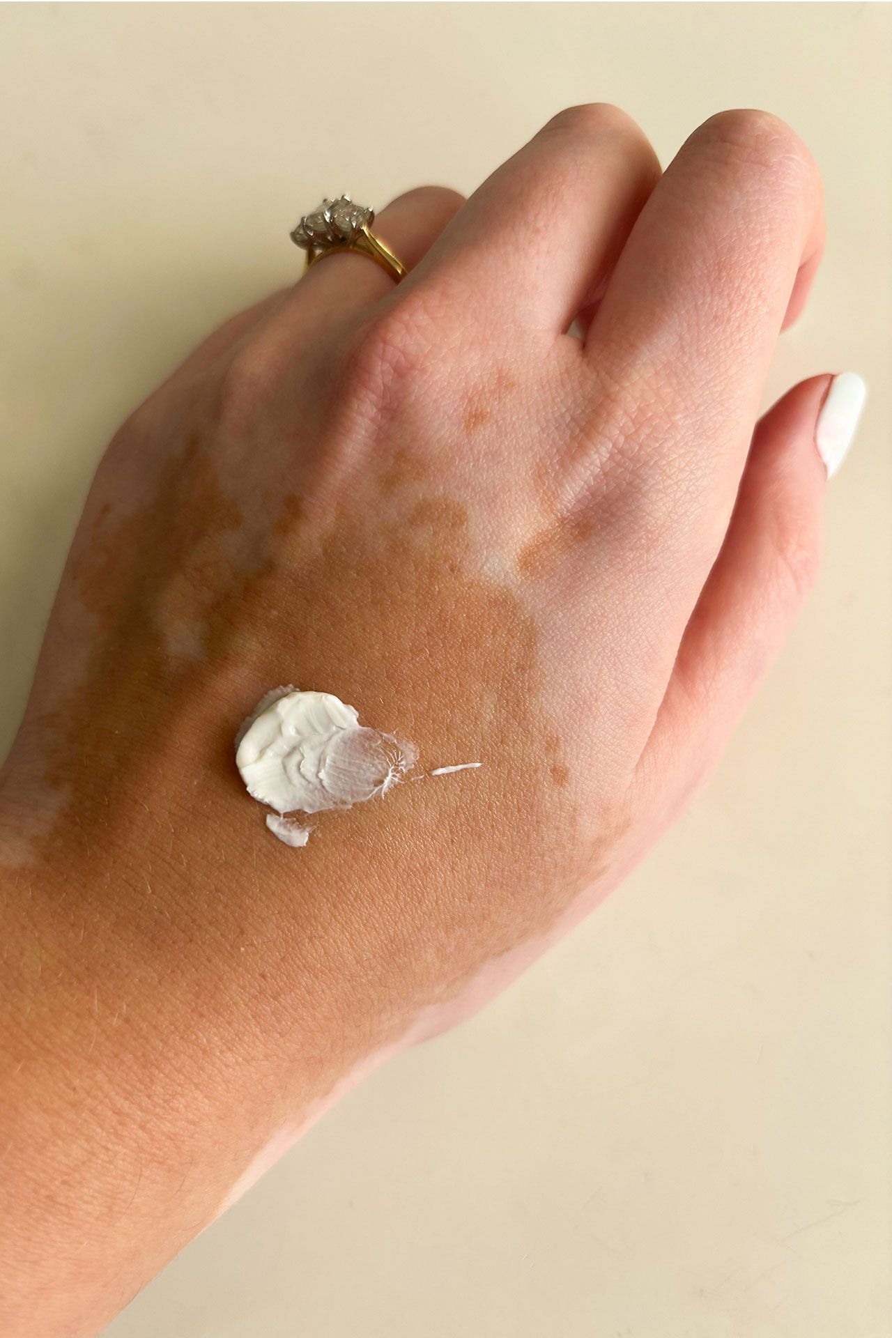 Image may contain Person Skin Baby Body Part Hand Wrist and Finger