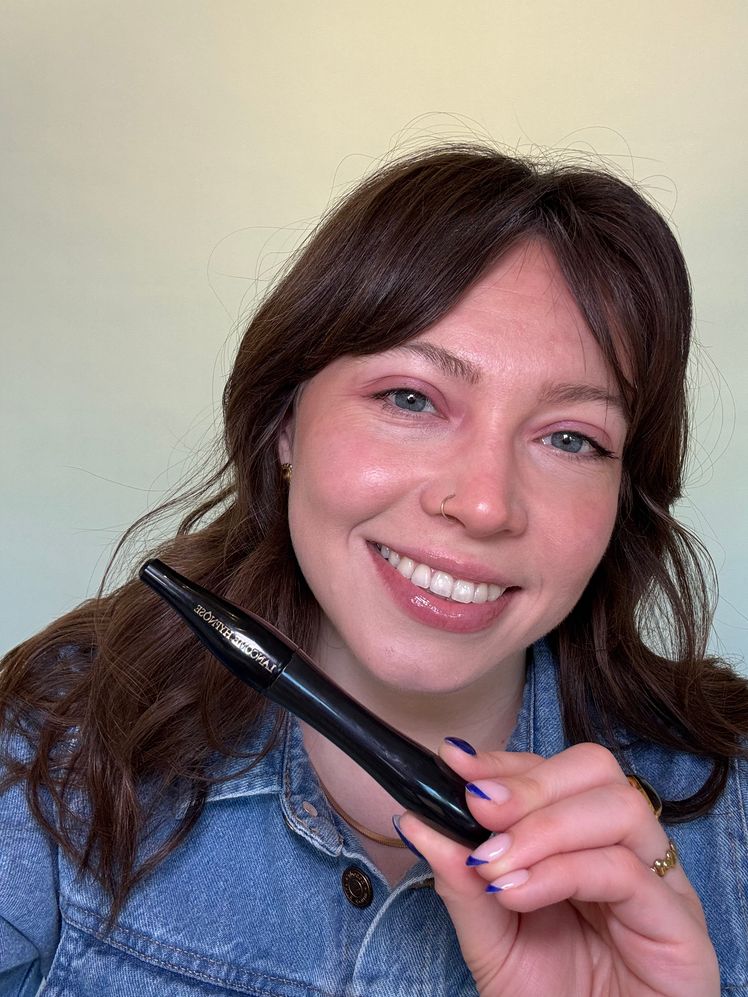 Image may contain: Face, Head, Person, Photography, Portrait, Body Part, Finger, Hand, Accessories, Jewelry, Ring, and Pen