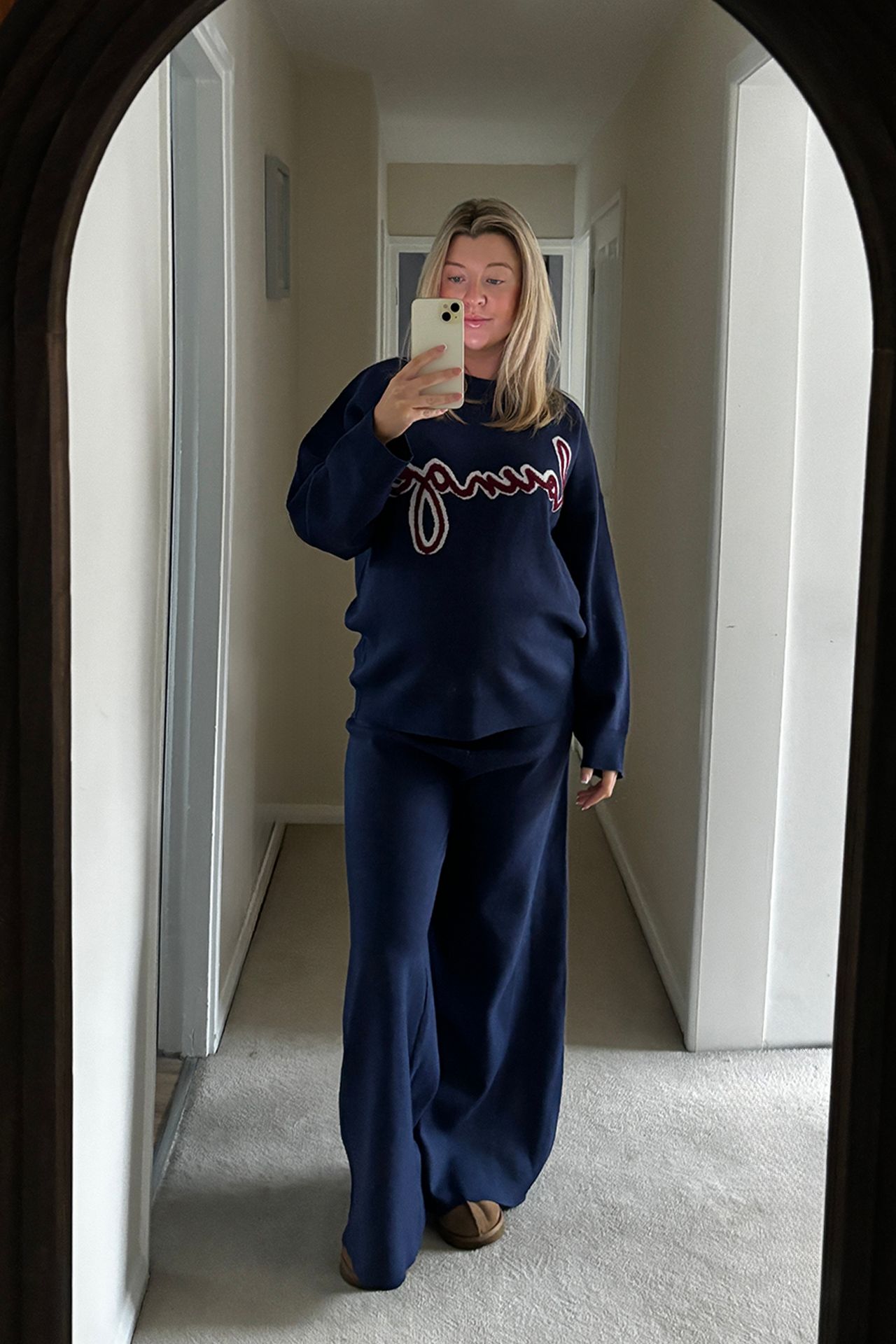 Image may contain Clothing Pants Formal Wear Suit Face Head Person Adult Blonde Hair Long Sleeve and Sleeve