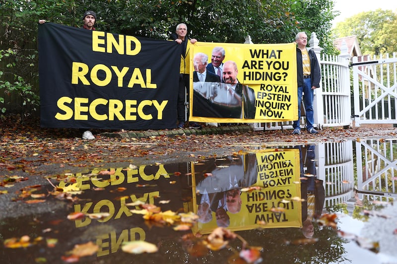 WINDSOR, ENGLAND - OCTOBER 21: Activists from the anti-monarchy group Republic, stage a protest at the entrance to Windsor Great Park and Royal Lodge where Prince Andrew lives on October 21, 2025 in Windsor, England. In a statement Prince Andrew confirmed that he will no longer use his royal titles or honours following continued accusations relating to his links to Jeffrey Epstein. (Photo by Peter Nicholls/Getty Images)