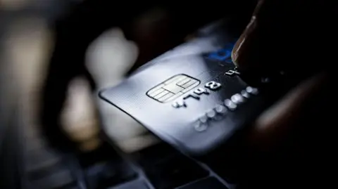 Getty Images A close up on the corner of a credit card 