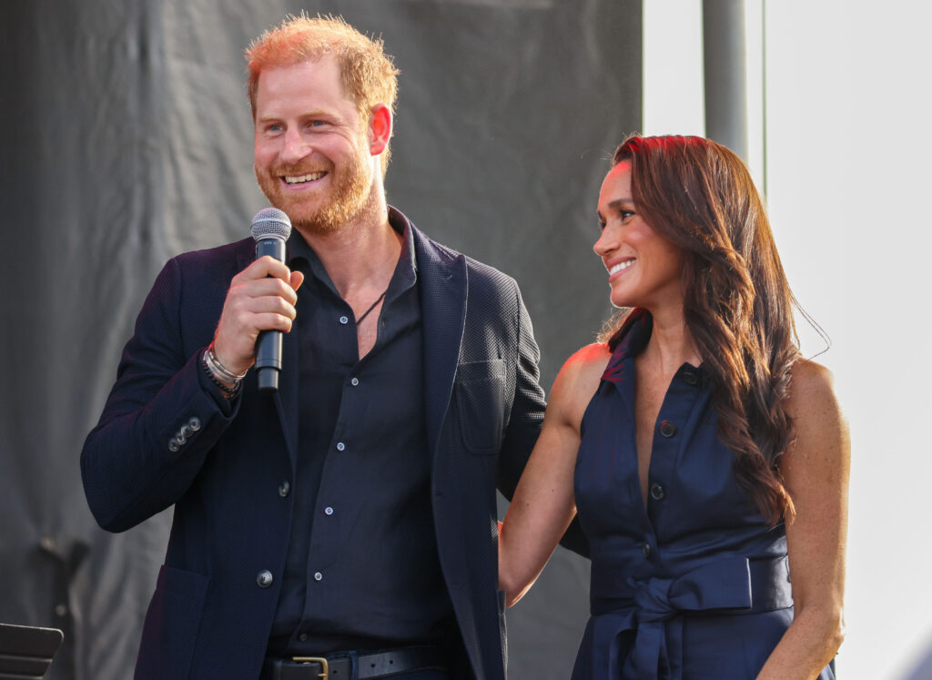Prince Harry and Meghan Markle smiling